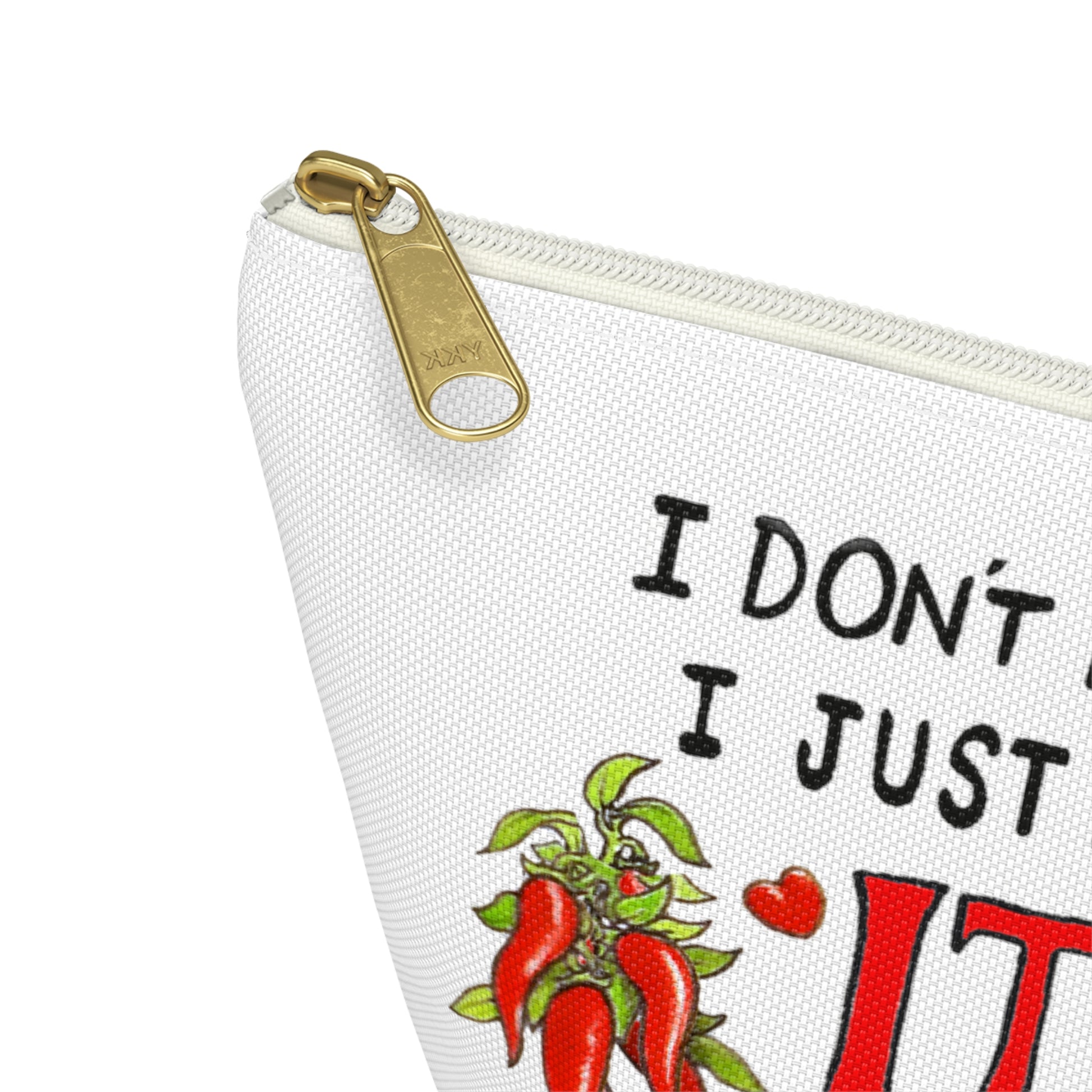 Italy inspired white canvas clutch with the quote I don't need therapy, I just need to go to Italy. The quote is in handwritten with the word Italy in red. On both sides of Italy there are bundles of peppers. The clutch has a black zipper that fits with the black text. Designed by Italian Summers