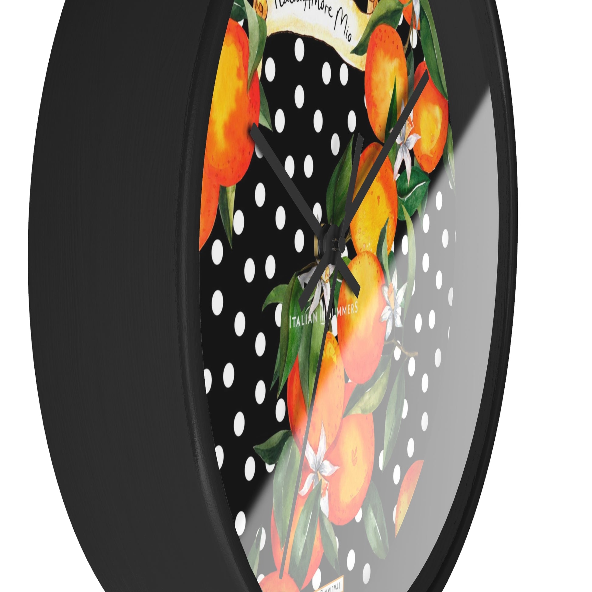 Wall clock SICILIAN GARDEN bursts with color, from the happy white polka dots to the lively orange blossoms. The timeless phrase 'Italia Amore Mio' adds a meaningful touch of love. Designed and sold by Italian Summers