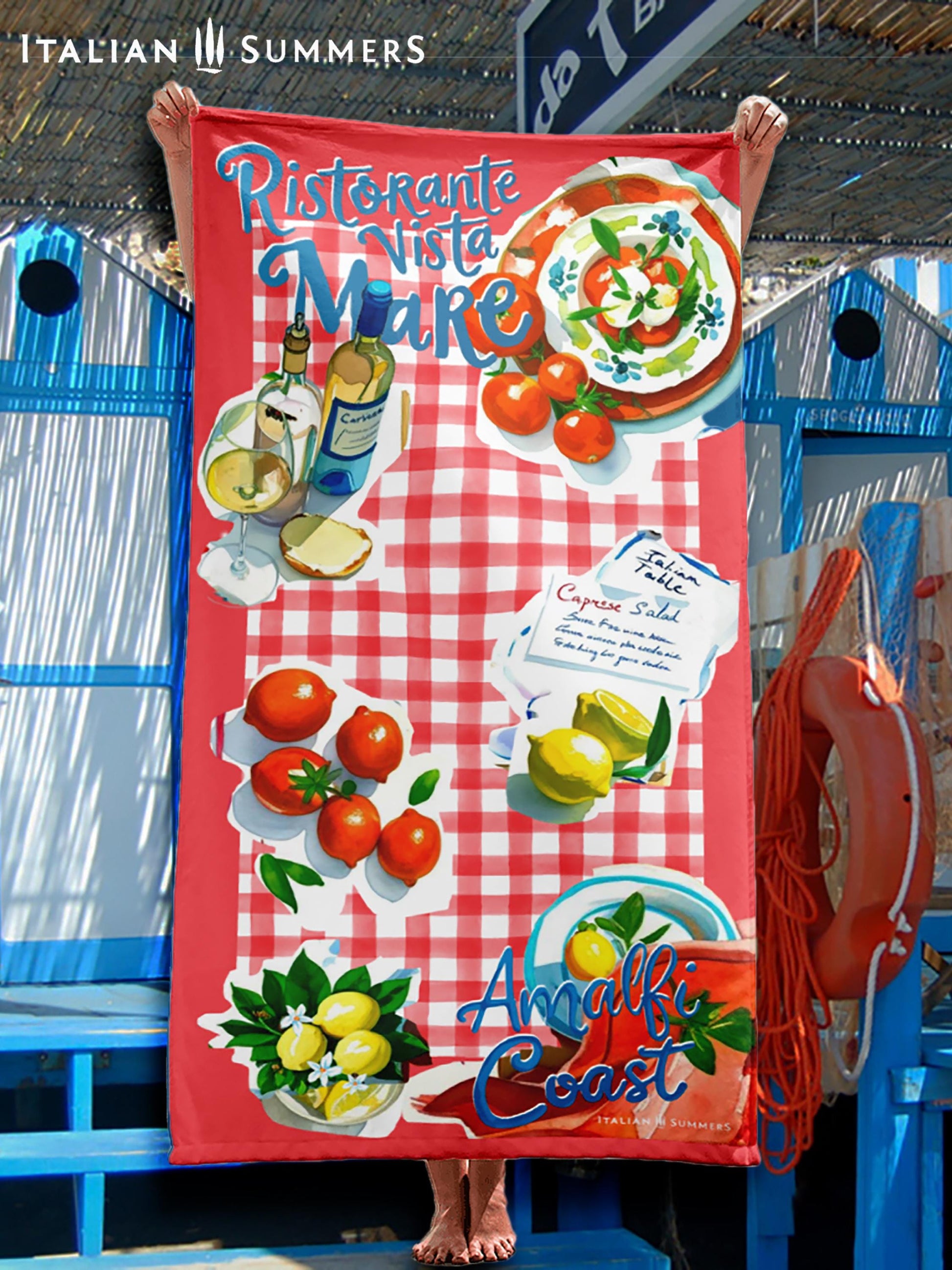 Two  beach towels featuring a red or blue  rim with red and white, or blue and white  checkered pattern, a collage of cut-out illustrations of Italian dishes such as in a quaint seaside restaurant, lemons, and a bottle of white wine, with the texts “Ristorante Vista Mare” on top and “Amalfi Coast” on the bottom, evoking an authentic Italian seaside trattoria vibe