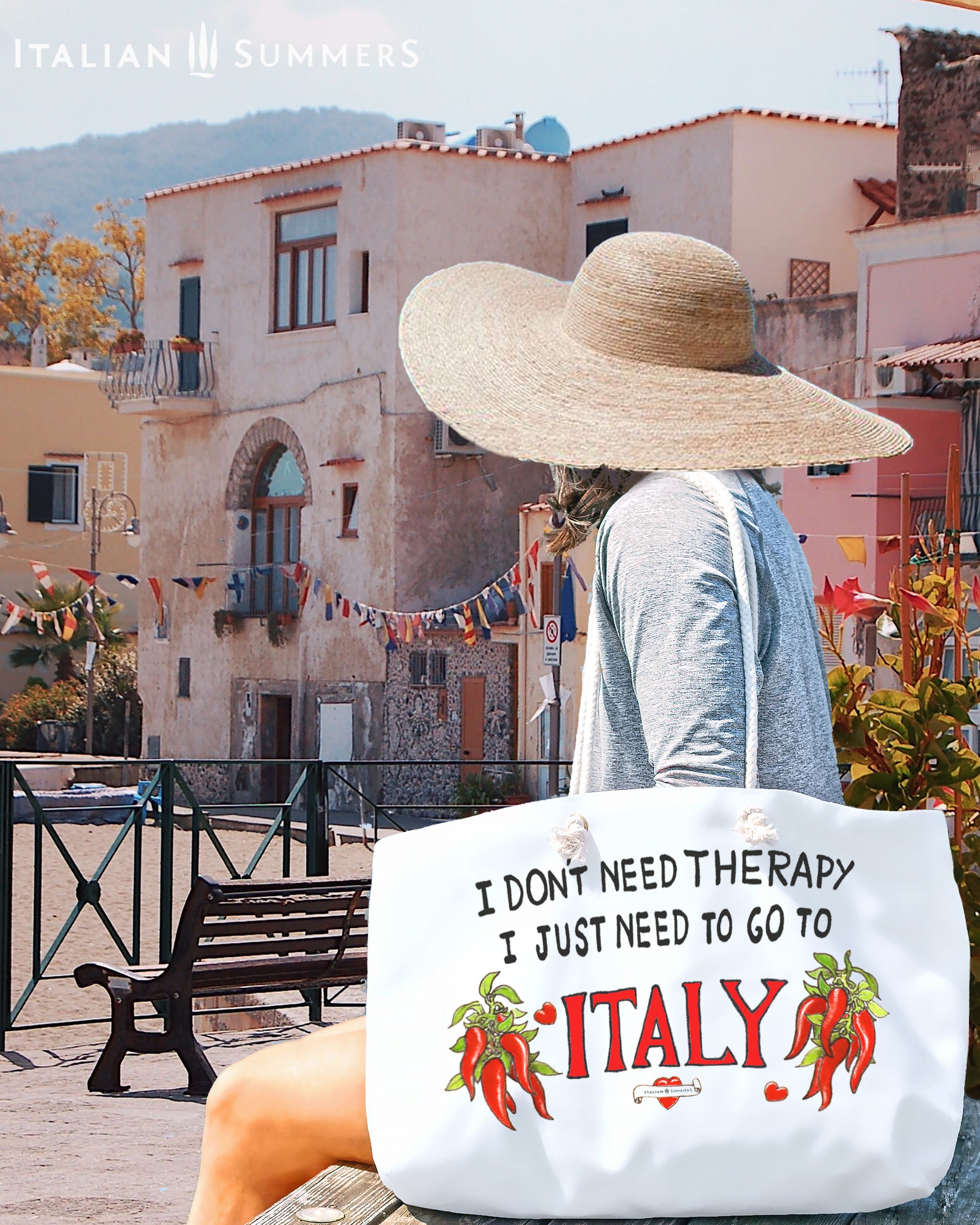 Italy inspired beach bag with the quote I don't need therapy, I just need to go to Italy. The quote is in black hand writing the word Italy is in the color red. On both sides of Italy there is a bunch of peppers. The bag has soft rope handles