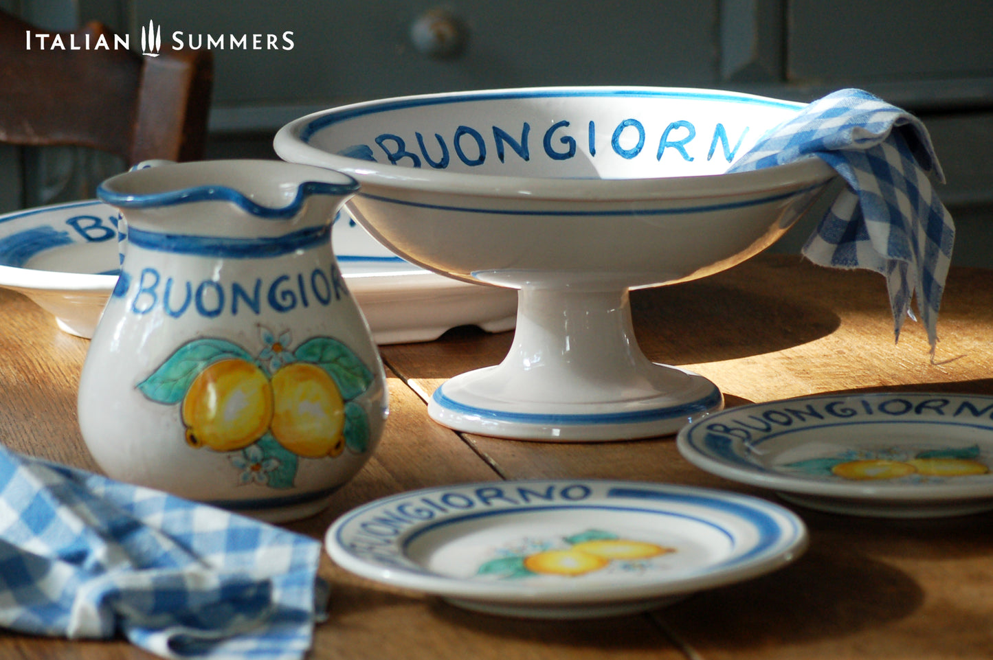 Italy ceramic fruit stand with Amalfi Coast lemons and the greeting Buongiorno . Hand painted in Sicily. Designed and sold by Italian Summers