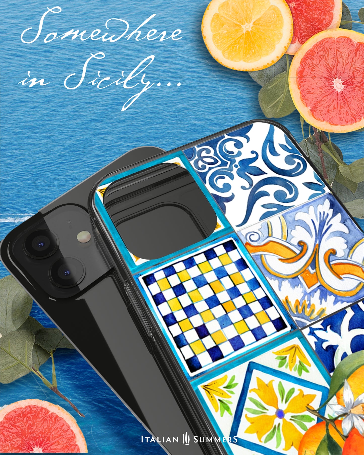 A colorful printed phone cover is shown covered with a bright pattern of Italian Maiolica tiles. The azure waters of the Mediterranean Sea are visible in the background. 