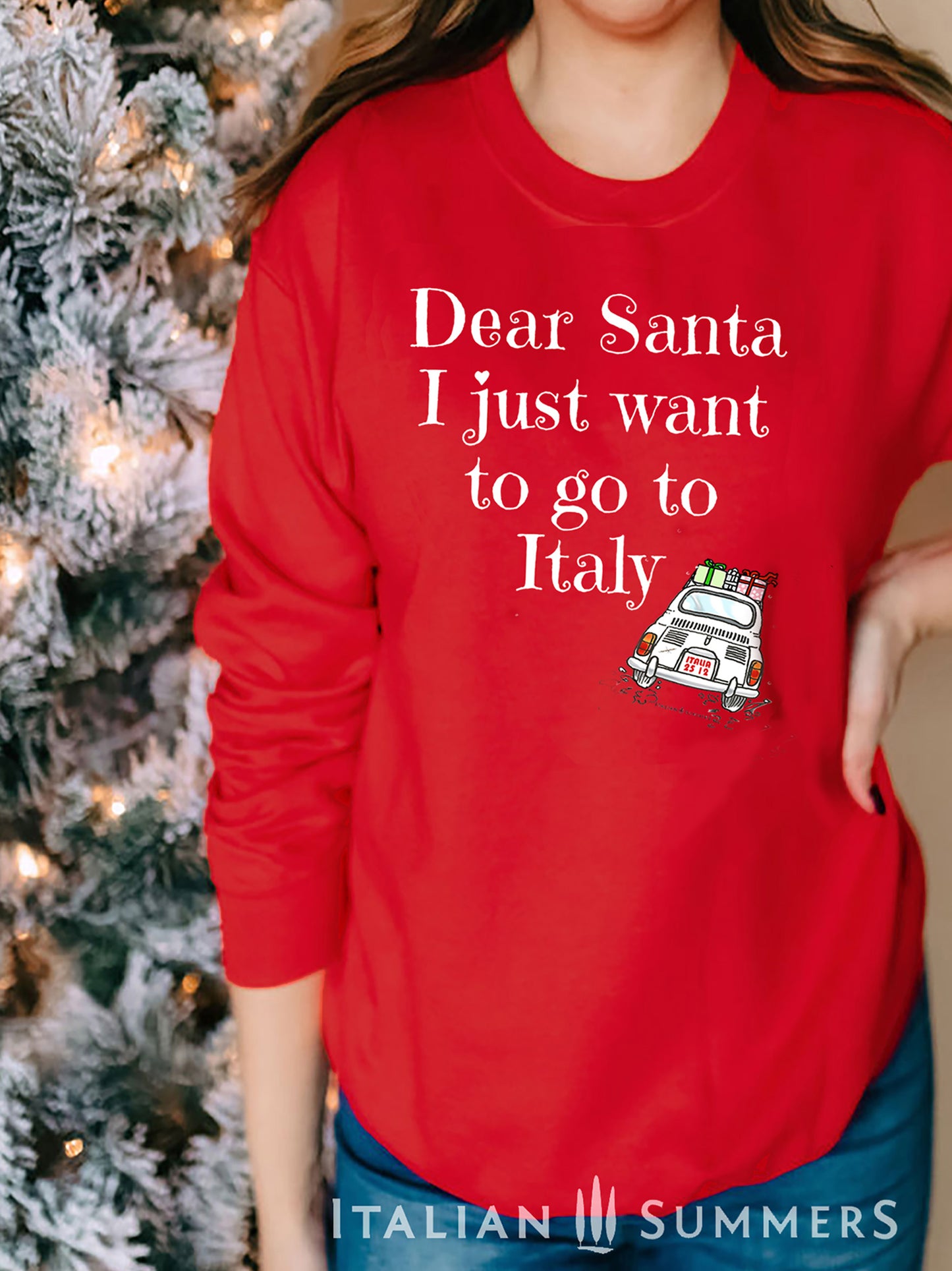 A soft, comfy and cozy Italy-Christmas inspired sweatshirt. It features the fun phrase: "Dear Santa, I just want to go to Italy", and a vintage Fiat 500 speeding away loaded with wrapped Christmas gifts: Buon Natale!