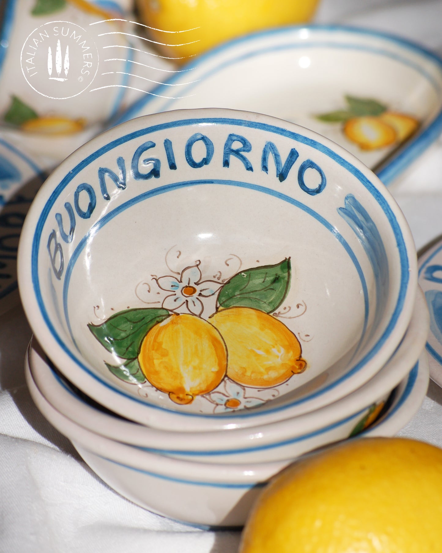 Italian ceramic lemon bowls with the text Buongiorno. The Amalfi coast lemons are hand painted on the inside of the bowl and the word Buongiorno is on the inside on the top of the rim. By Italian Summers