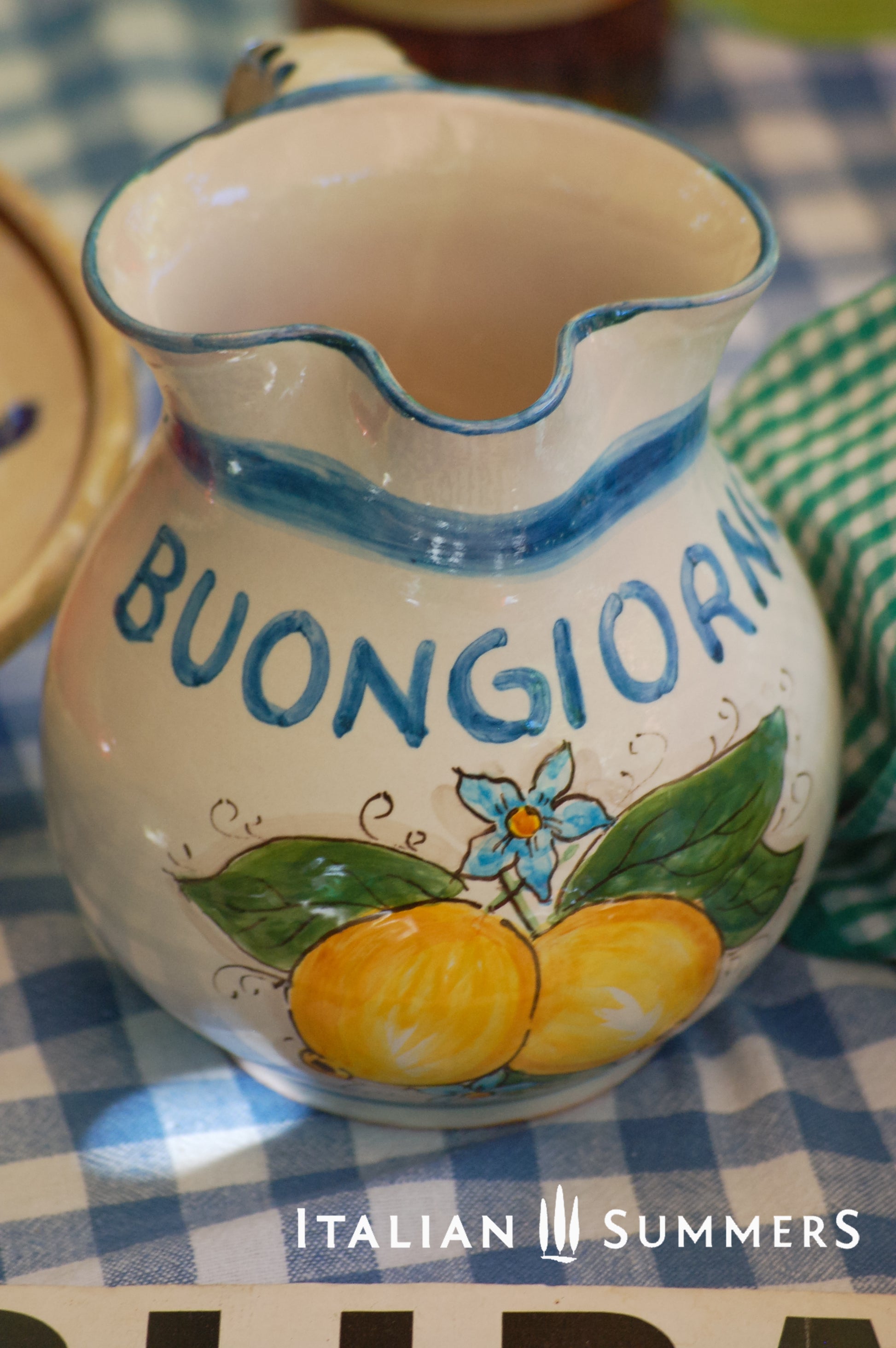 Bright and happy Italian ceramic brocca with handpainted Amalfi Coast lemons and the text Buongiorno in the color azur blue. By Italian Summers
