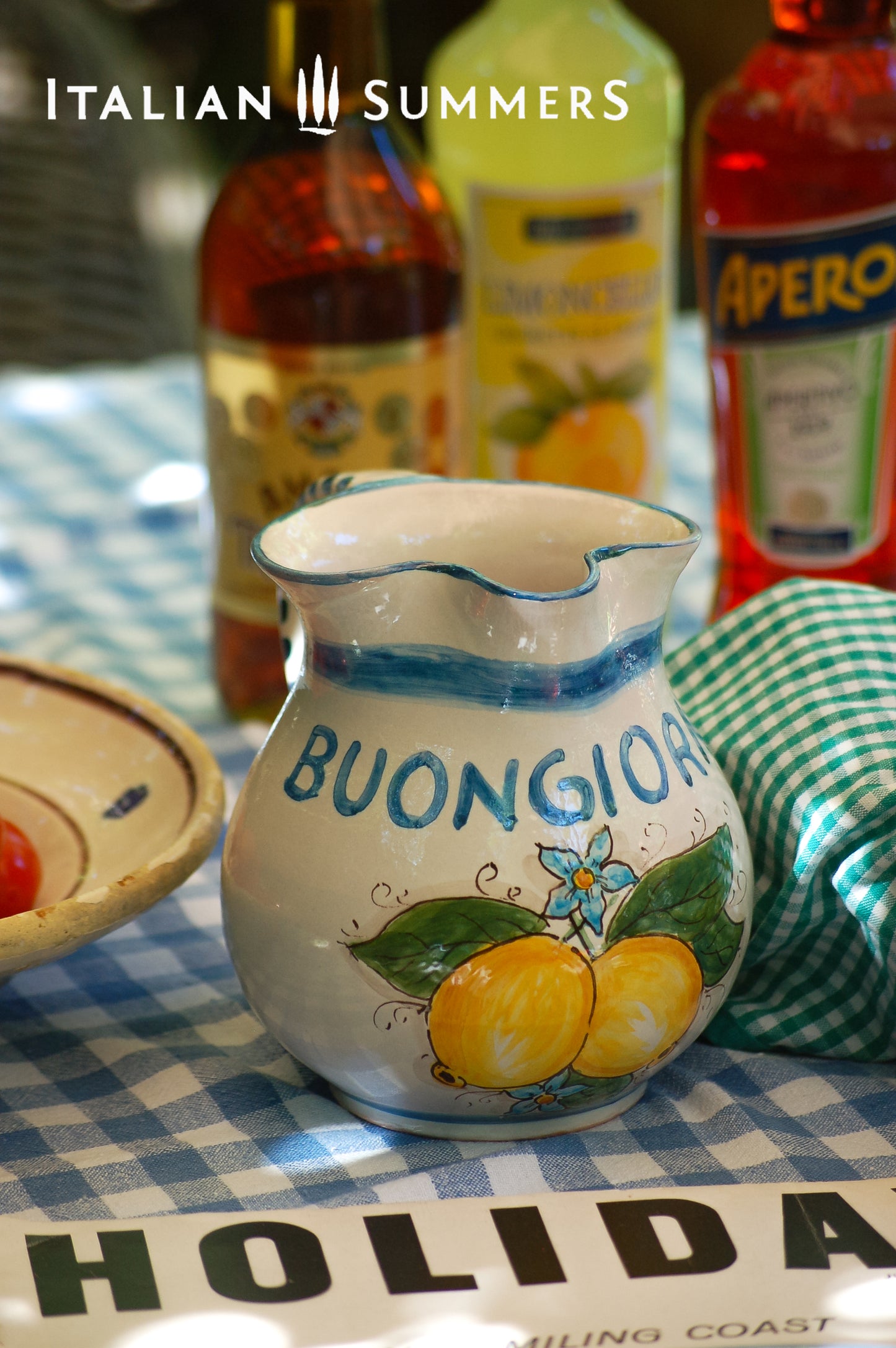 Bright and happy Italian ceramic brocca with handpainted Amalfi Coast lemons and the text Buongiorno in the color azur blue. By Italian Summers