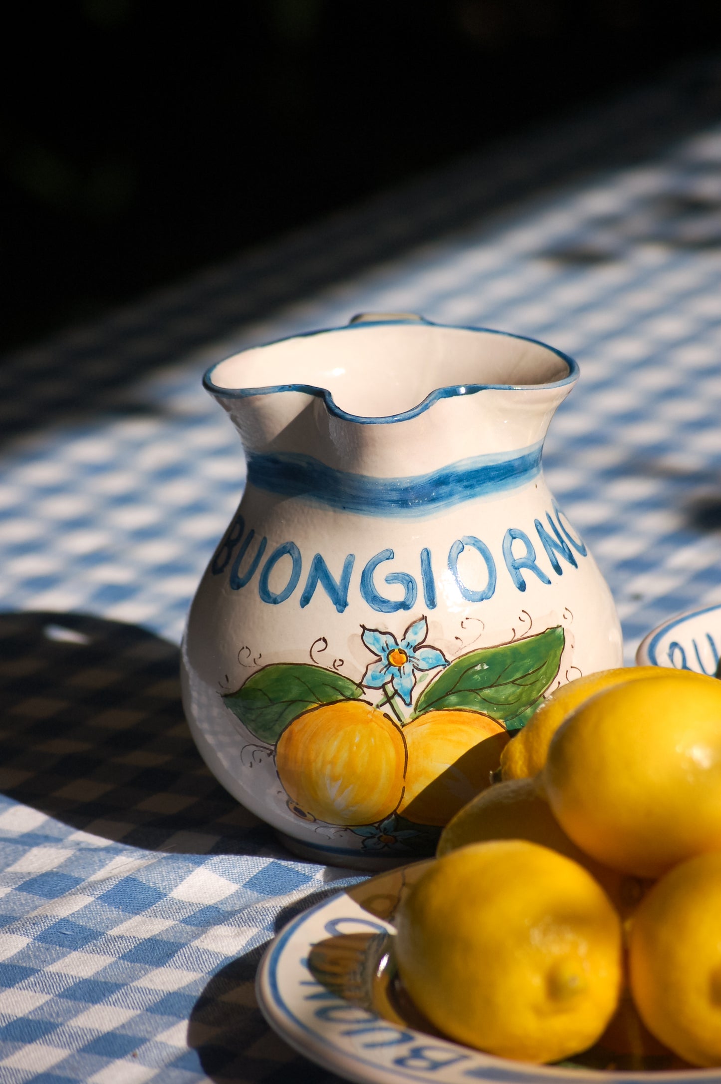 Bright and happy Italian ceramic brocca with handpainted Amalfi Coast lemons and the text Buongiorno in the color azur blue. By Italian Summers