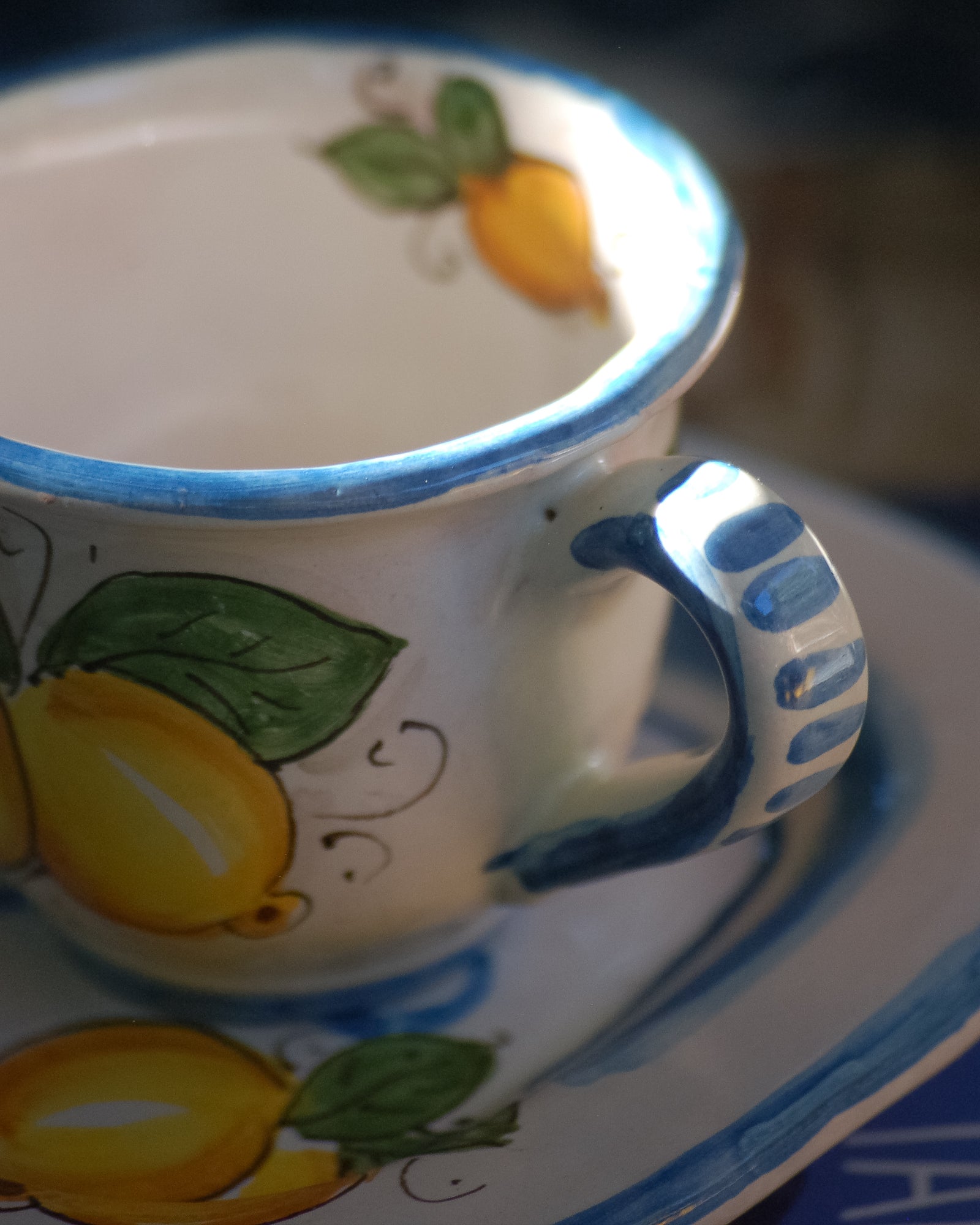 Italian ceramic breakfast set made up of two espresso cups with a tray, and wo bowls. All decorated with light marine blue stripes and vibrant hand painted Amalfi Coast lemons. The tray has the tex: "La vita e' piu bella con te" (life is more beautiful with you) or "Buongiorno" Artisan-made on the island of Sicily