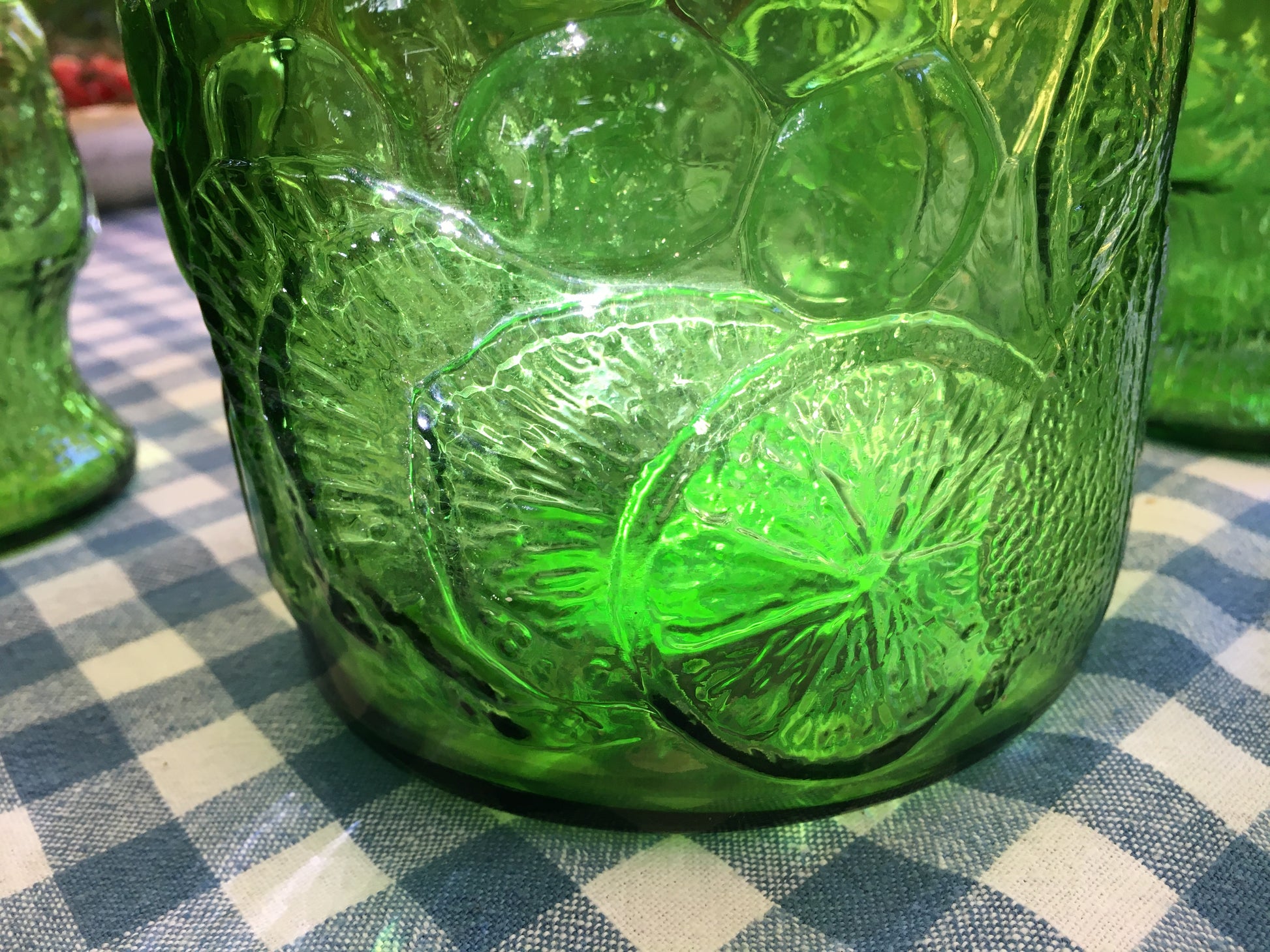 Italy vintage green glass set  by Bormioli with embossed Lemon slices, 6 tumblers and a carafe by Italian Summers