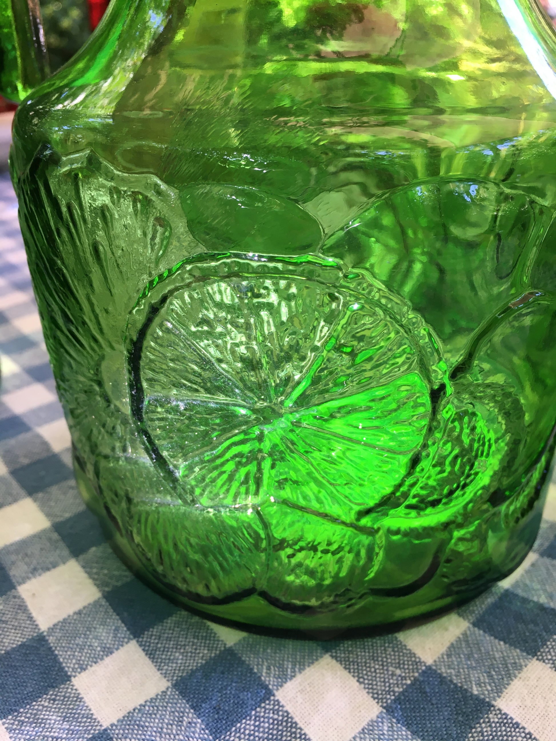 Italy vintage green glass set  by Bormioli with embossed Lemon slices, 6 tumblers and a carafe by Italian Summers
