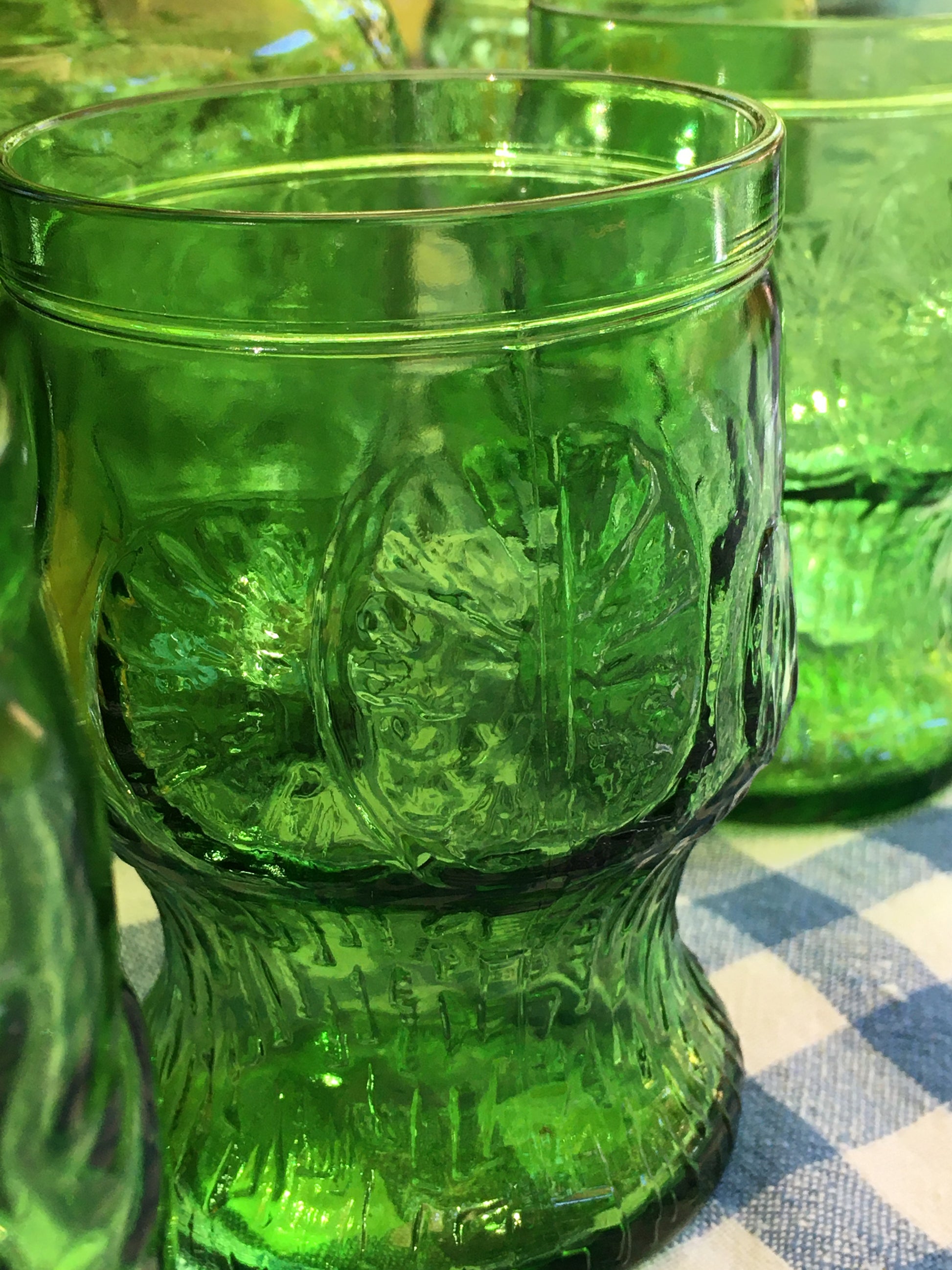 Italy vintage green glass set  by Bormioli with embossed Lemon slices, 6 tumblers and a carafe by Italian Summers