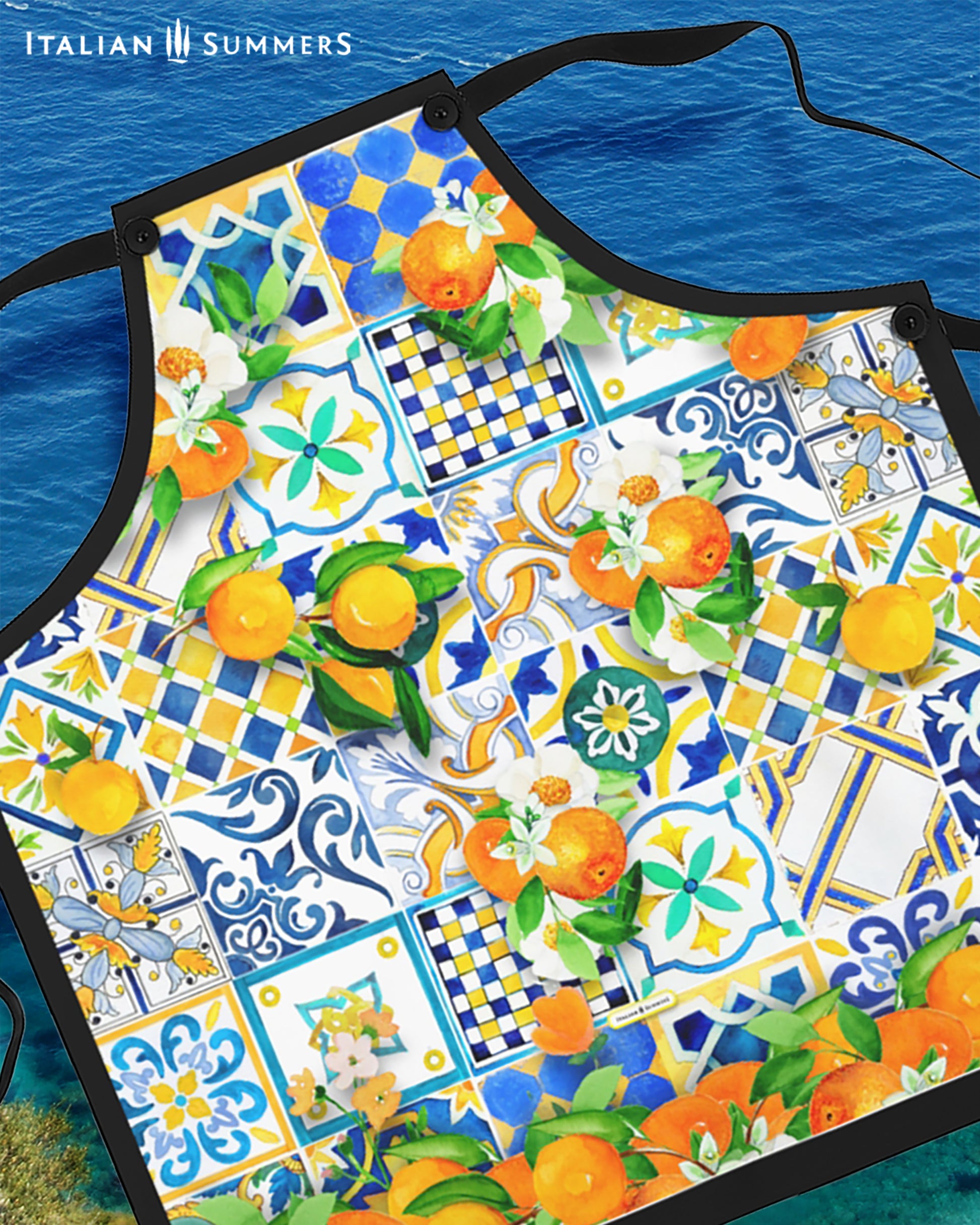 Italy-inspired apron decorated with bright, sunny  and colorful tiles reminiscent of the Amalfi Coast . All decorated with bundles of oranges with blooms.  A must-have for anyone who loves Italy.