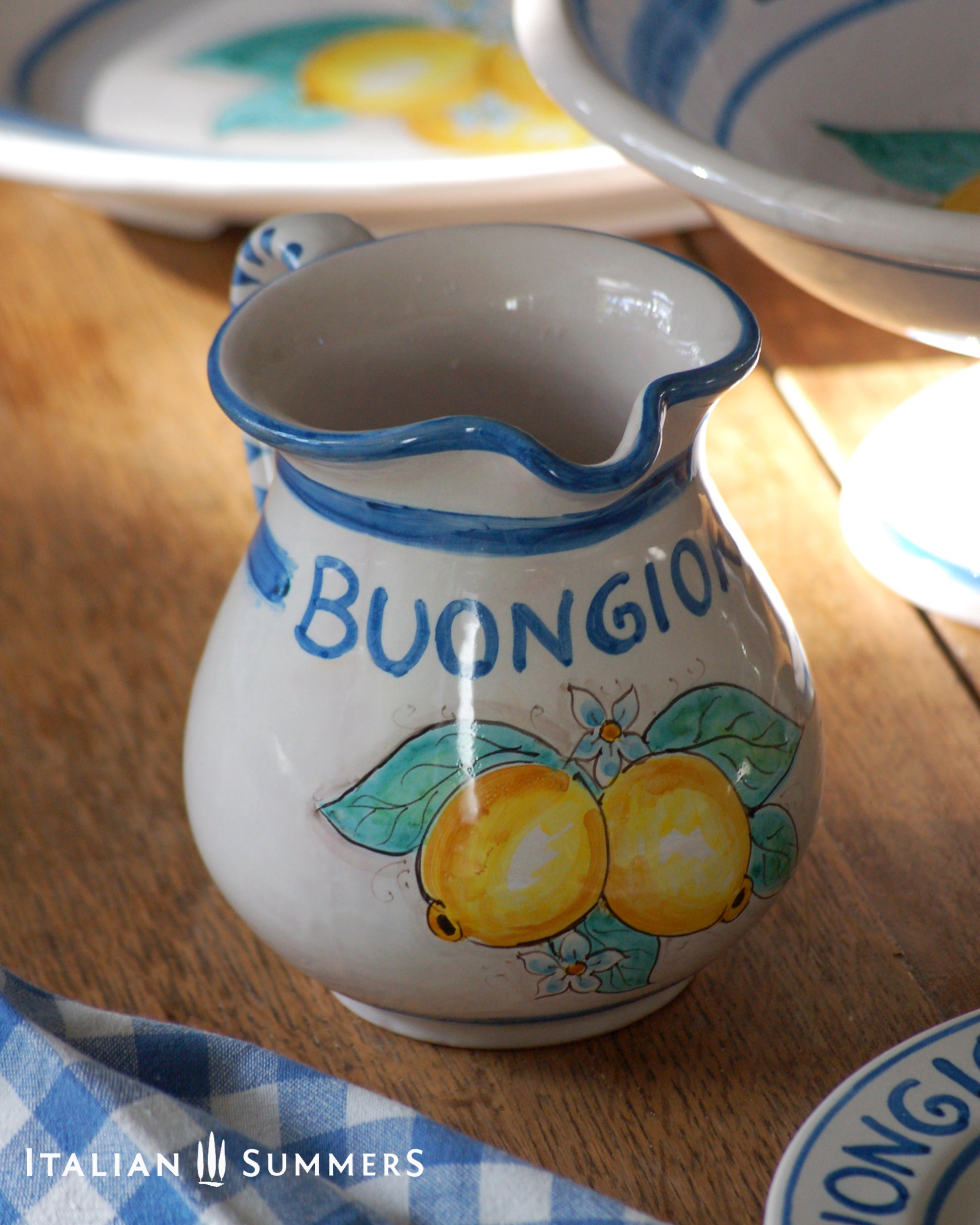 Italy ceramic carafe with buongiorno gretting , blue line and Amalfi Coast lemons. Handpainted in Sicily. Designed and sold by Italian Summers