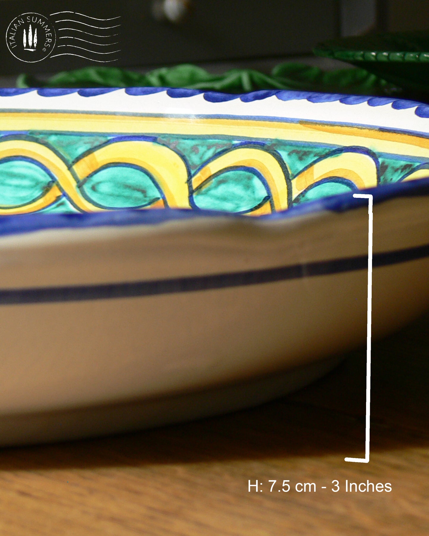 A large Siciian Maiolica ceramic platter decorated with rich traditional turquoise and cobalt and yellow glazed colors in the traditional Caltagirone style