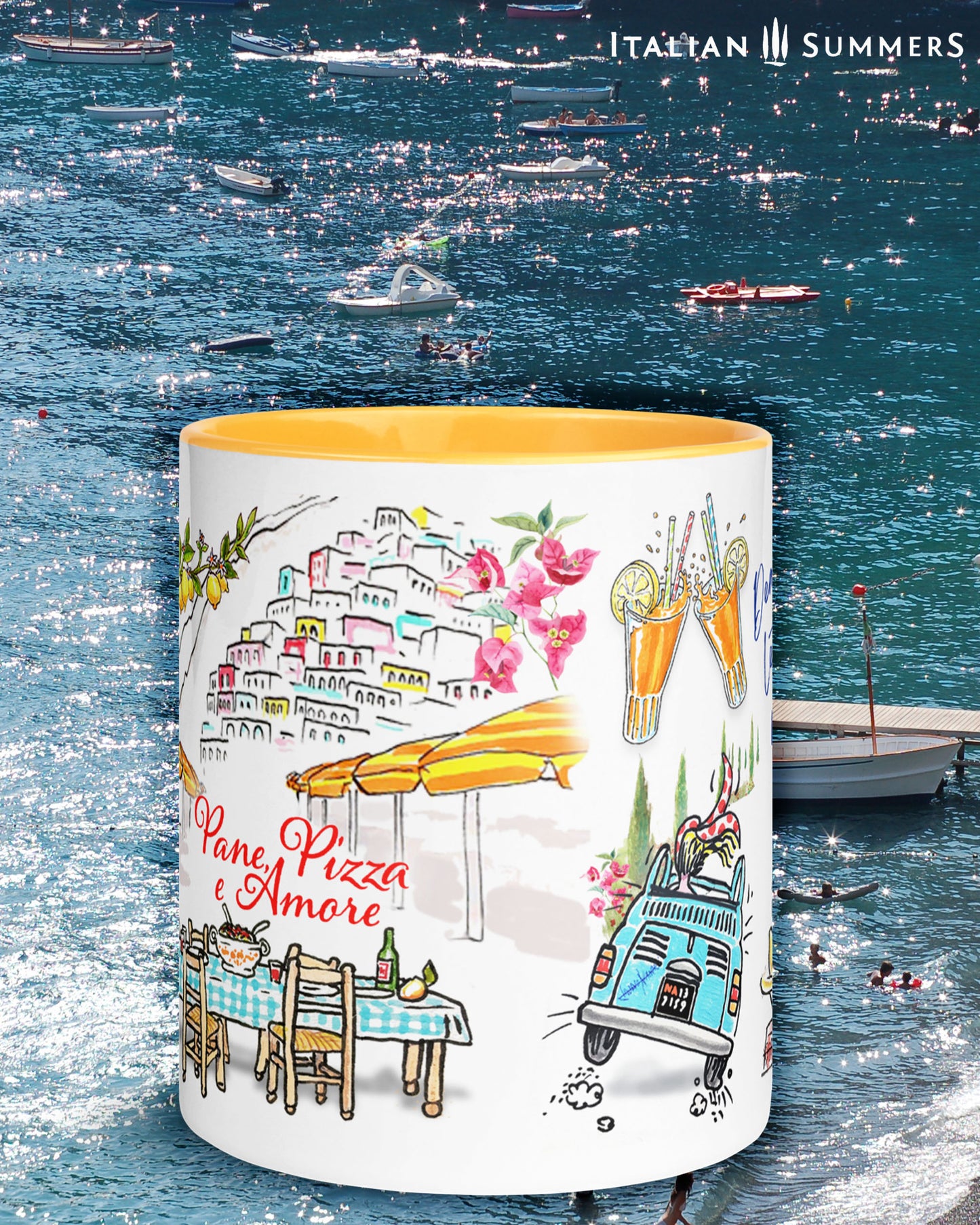 A made to order mug decorated with a print of colorful beach umbrellas on the Amalfi coast, two glasses with a red drink and straws clinking together, and a colorful sketch of Positano in the backround. A texts states: See you in the Piazza