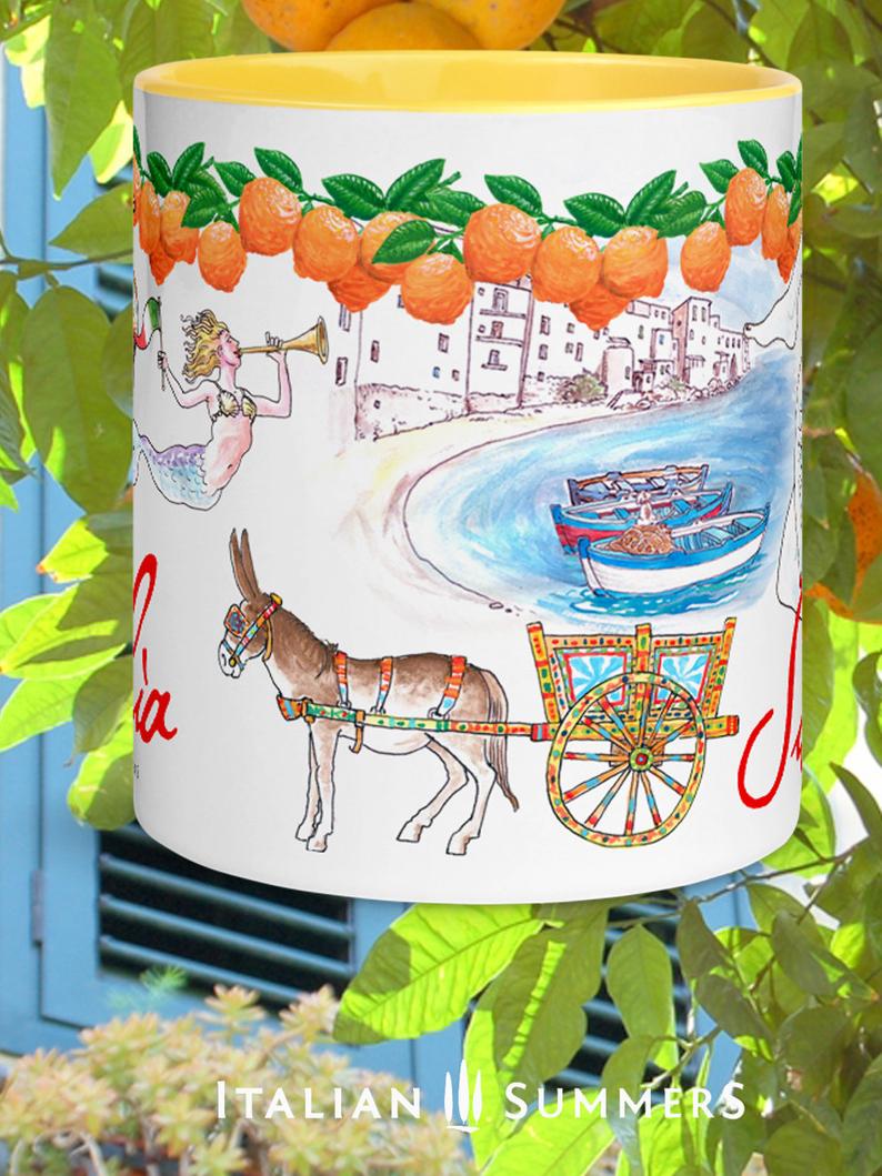 Sicily inspired mug with sketches of the seaside town Cefalu, a trinacria, a Sicilian caretto with of course a cute little donkey , a moore head and a mermaid. On the rim there is a garland of Sicilian oranges. Sicilia is written on the mug in a red handwriting