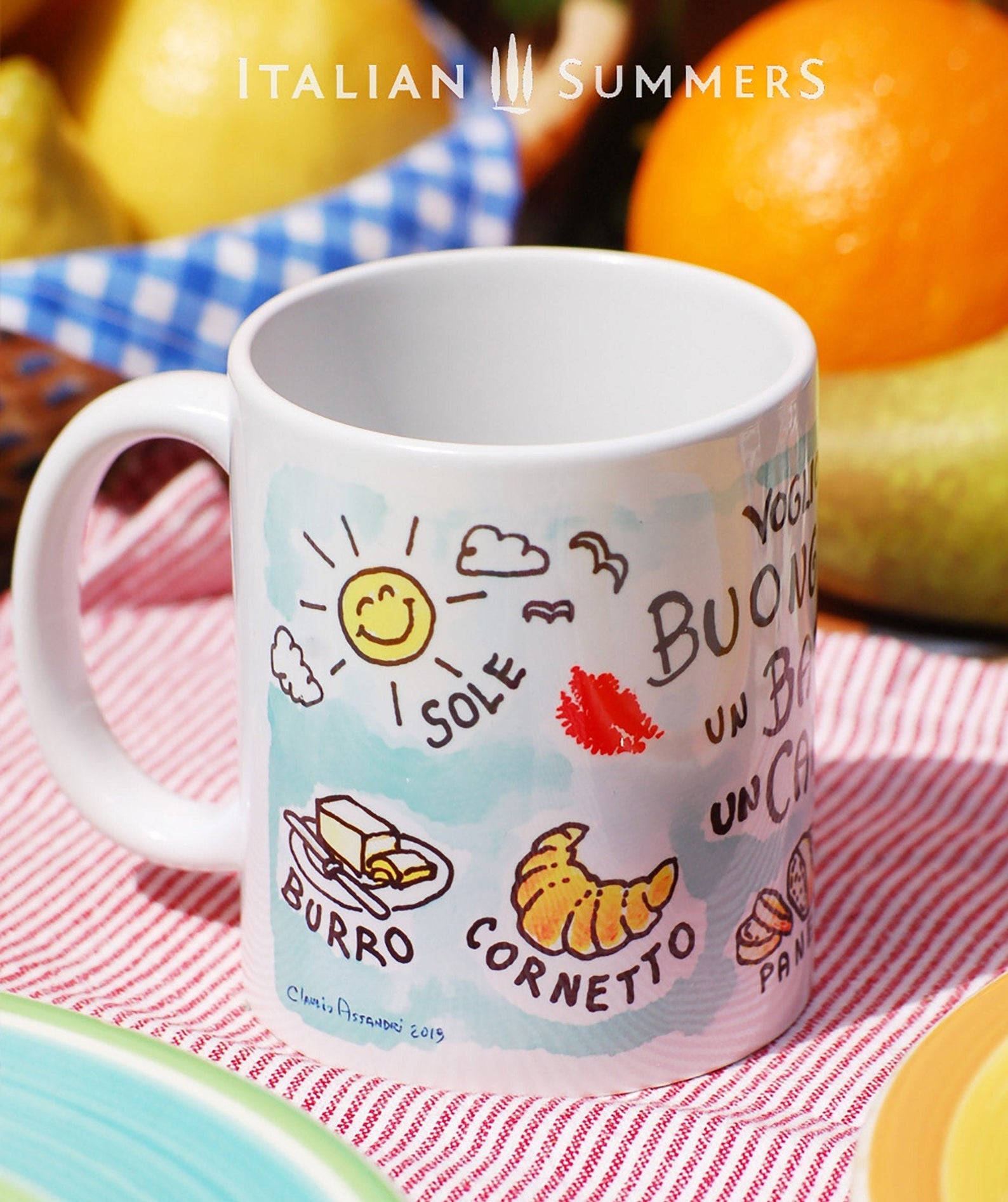 Italy inspired mug with the Italian title Voglio un Buongiorno, un Bacio e un caffe. The mug has a soft blue background and cute little sketches of items conected to Italian breackfast. A kiss, coffe, bread. Made by Italian Summers
