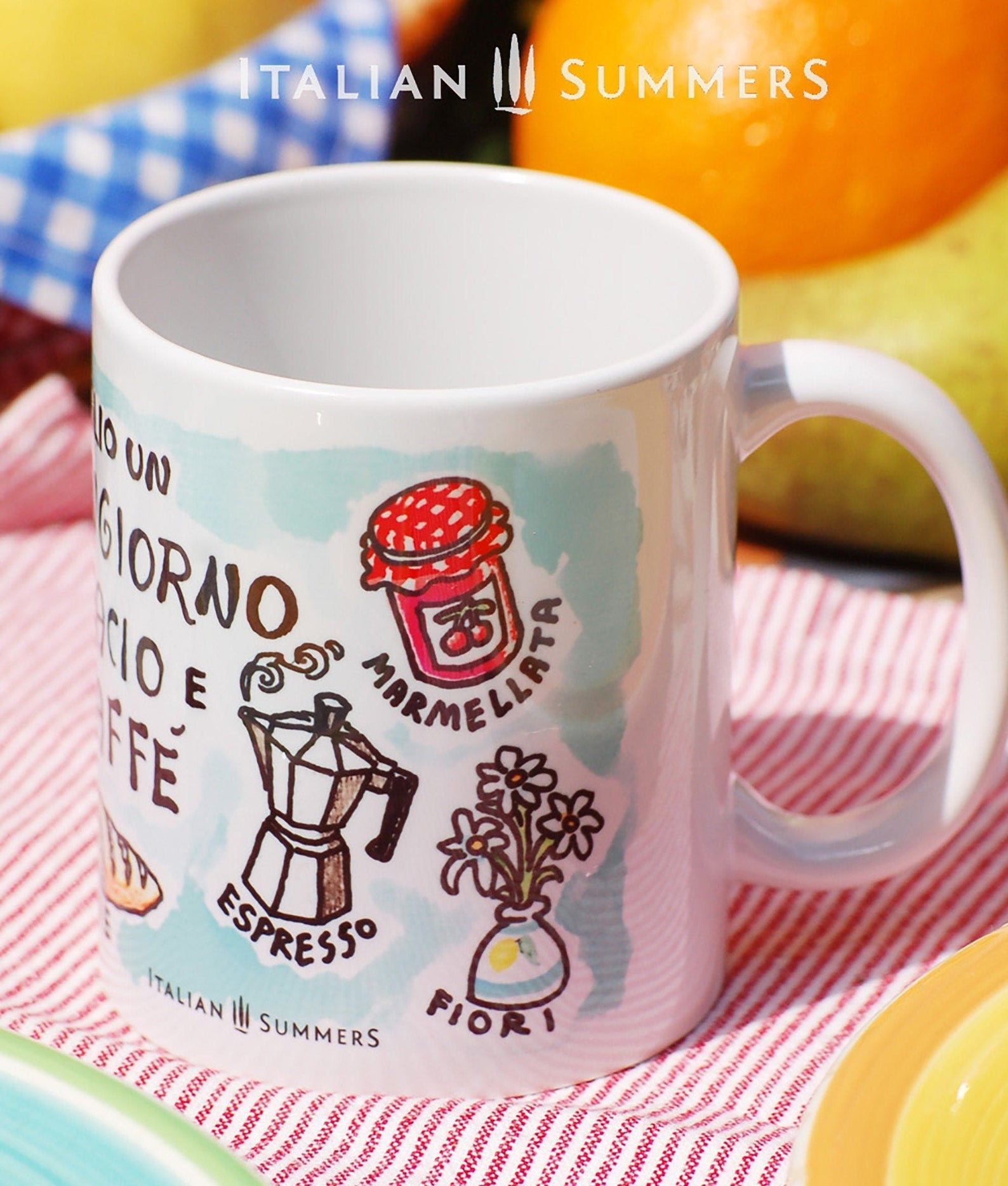 Italy inspired mug with the Italian title Voglio un Buongiorno, un Bacio e un caffe. The mug has a soft blue background and cute little sketches of items conected to Italian breackfast. A kiss, coffe, bread. Made by Italian Summers