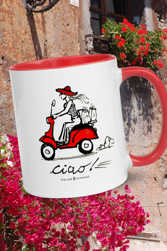 Italy inspired mug with a sketch of a lady with long hair and a red hat driving a red Italian vintage scooter. On the back of the scooter she has her shopping bags. The lady and the Vespa are seen from the side. Under the Italian sketch is the word Ciao! in black handwriting. The mug has a red color inside and a red handle. Made by Italian Summers.