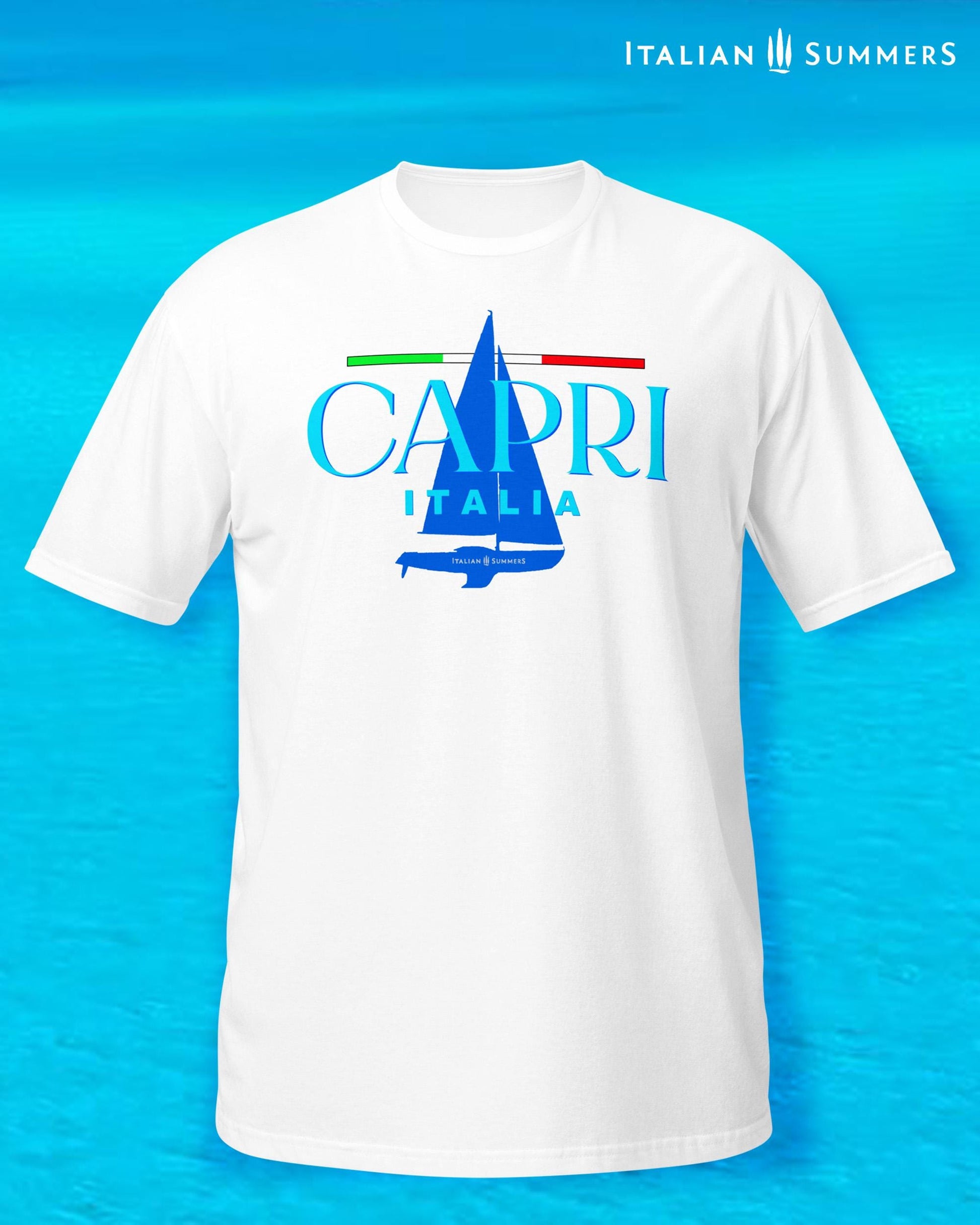 A white T shirt with a frontal print featuring a marine blue silhouette of a sailboat and a large text: CAPRI, ITALIA, with a thin Italian flag as a chevron, looking like a sailing shirt for sportsmen or Mediterranean Sea enthusiasts.