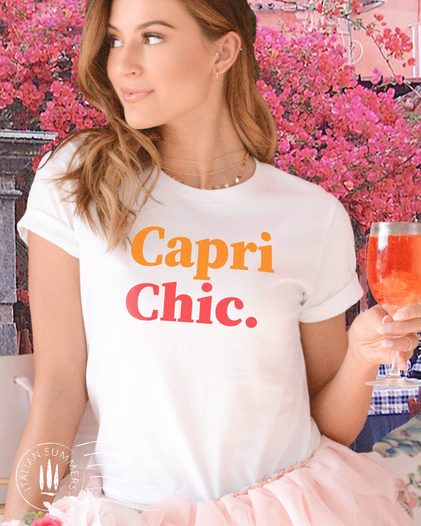 A girl is wearing an Italy inspired t-shirt with the words Capri Chic in the text color yellow for Capri and vintage red for Chic. Designed and sold by Italian Summers