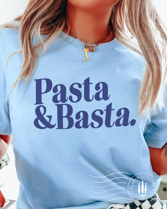 A girl is wearing a lItaly-inspired light blue Unisex crew neck T shirt with a large retro text: Pasta & Basta.