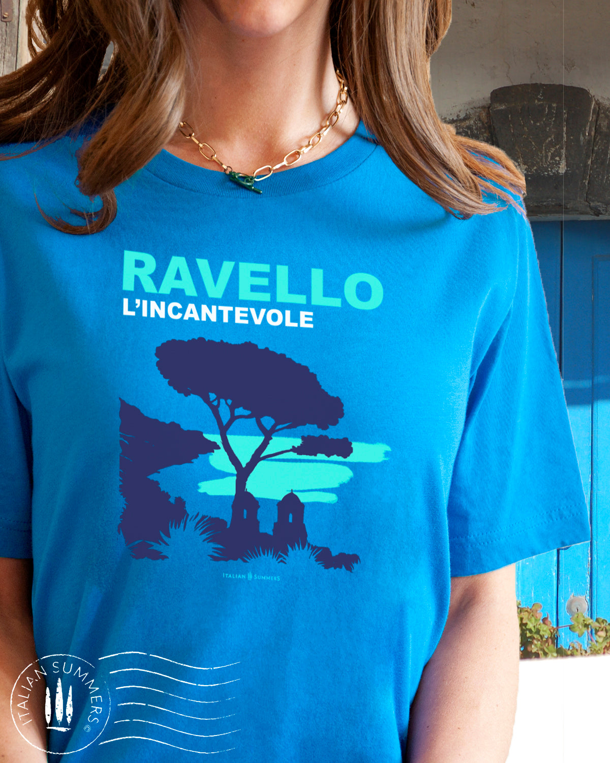 Italy-inspired garment dyed T shirt with a print of the Amalfi Coast location of Ravello with the quote of "Ravello, l'incantevole" Ravello the enchanting. Made by Italian Summers