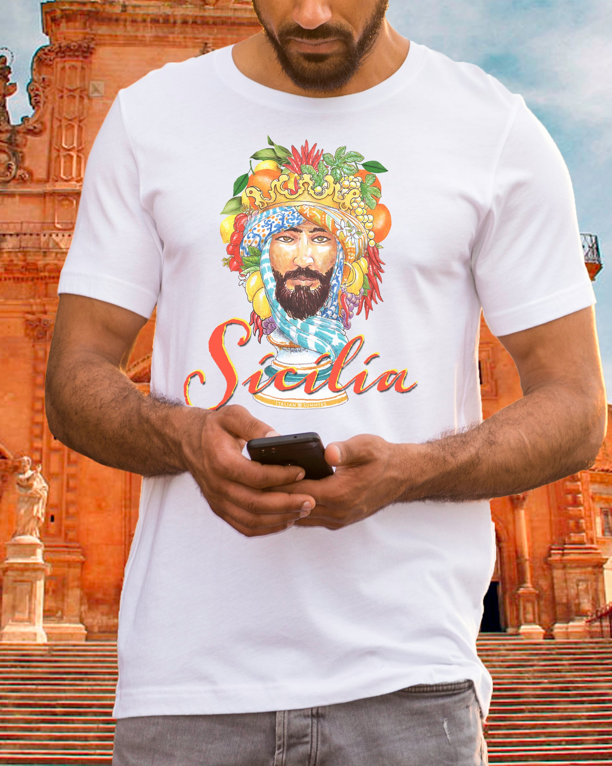 Italy inspired cotton unsex crew-neck T shirt with a hand-illustrated print of a decorative Moor's head from the Sicilian tradition of Caltagirone ceramic sculptures depicting the head of a Moorish nobleman with turban and decorative fruits.