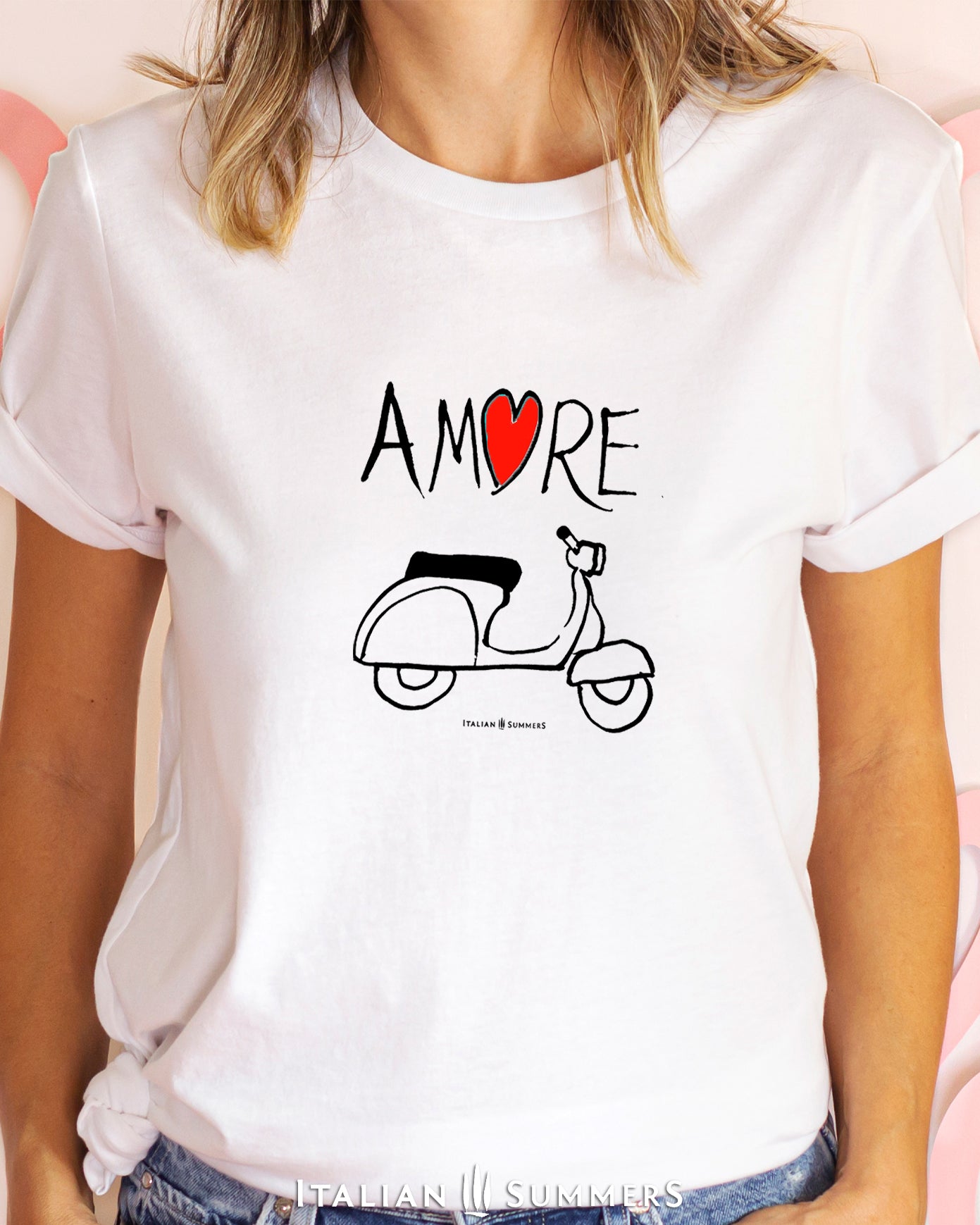 Italy inspired  white T Shirt  with a print of  hand-painted artwork we produced for a ceramic plate.  The  the word 'Amore'  with a vintage Vespa scooter  underneath. For all nostalgic Italy lovers, sure to bring a smile and a conversation in like-minded people! Made by Italian Summers