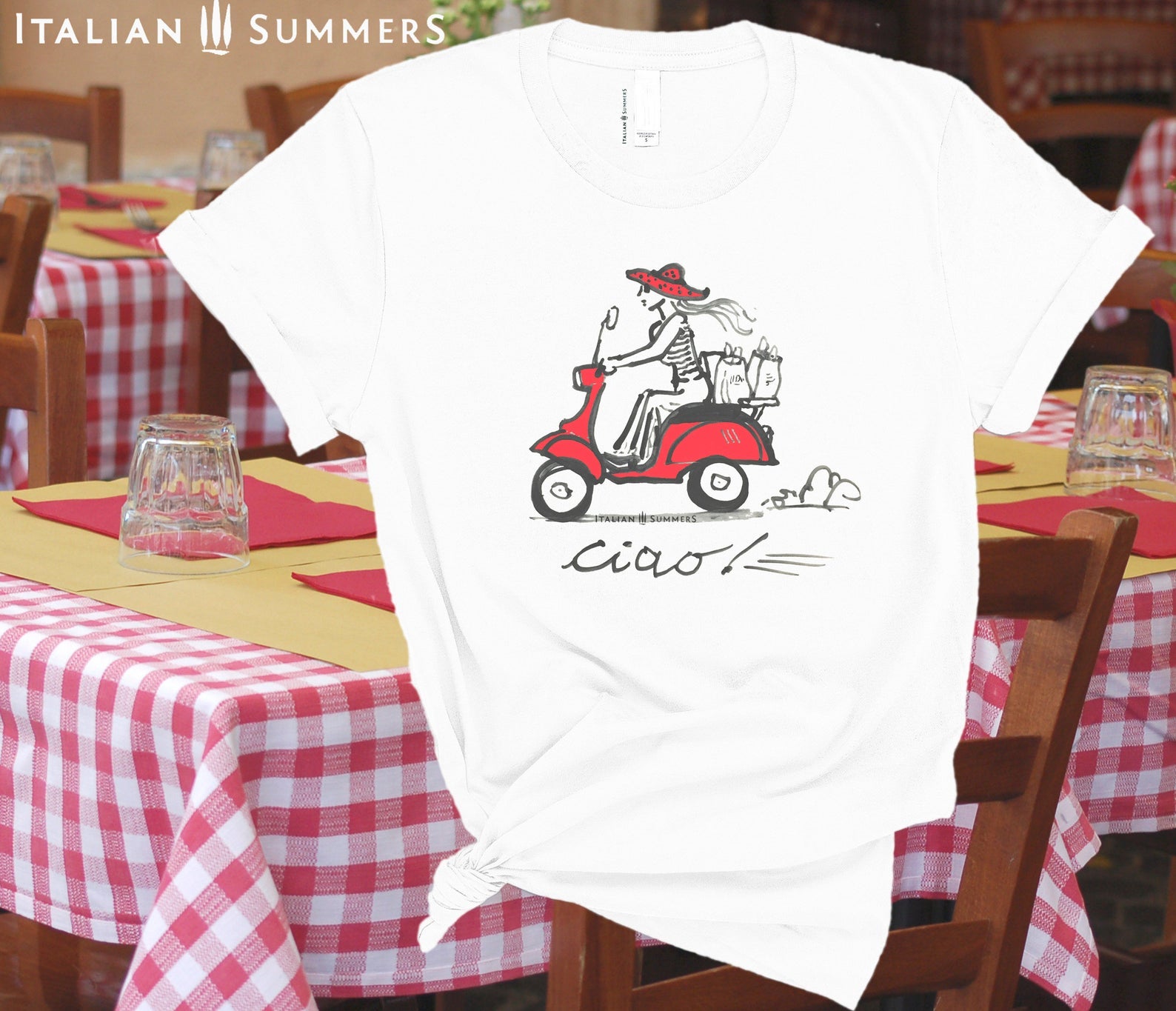Italy-Inspired white T shirt VESPA CIAO, features a print of our original handpainted design of a fashionable girl with a big summer straw hat speeding through an Italian town with shopping bags on a vintage red Vespa.