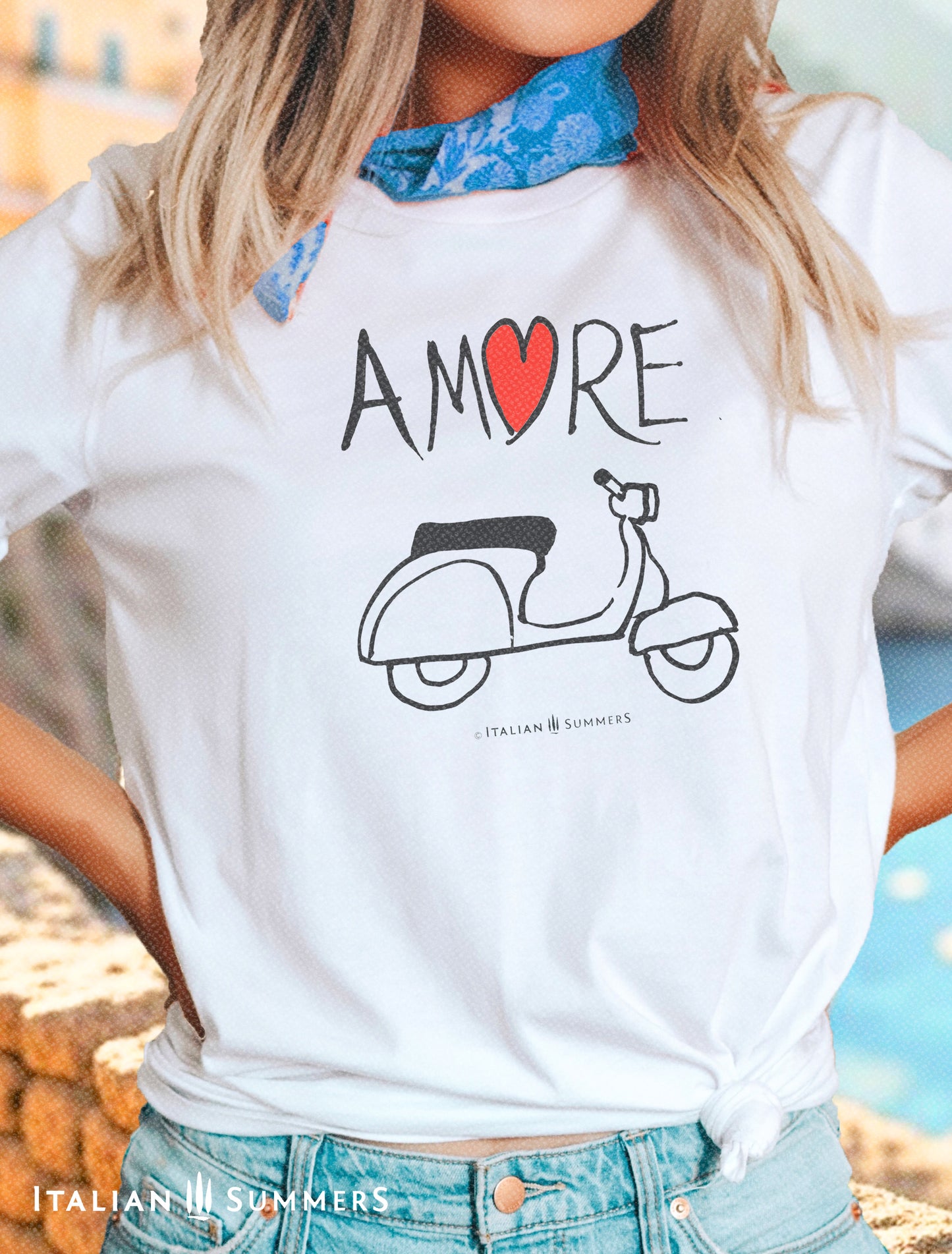Italy inspired  white T Shirt  with a print of  hand-painted artwork we produced for a ceramic plate.  The  the word 'Amore'  with a vintage Vespa scooter  underneath. For all nostalgic Italy lovers, sure to bring a smile and a conversation in like-minded people! Made by Italian Summers