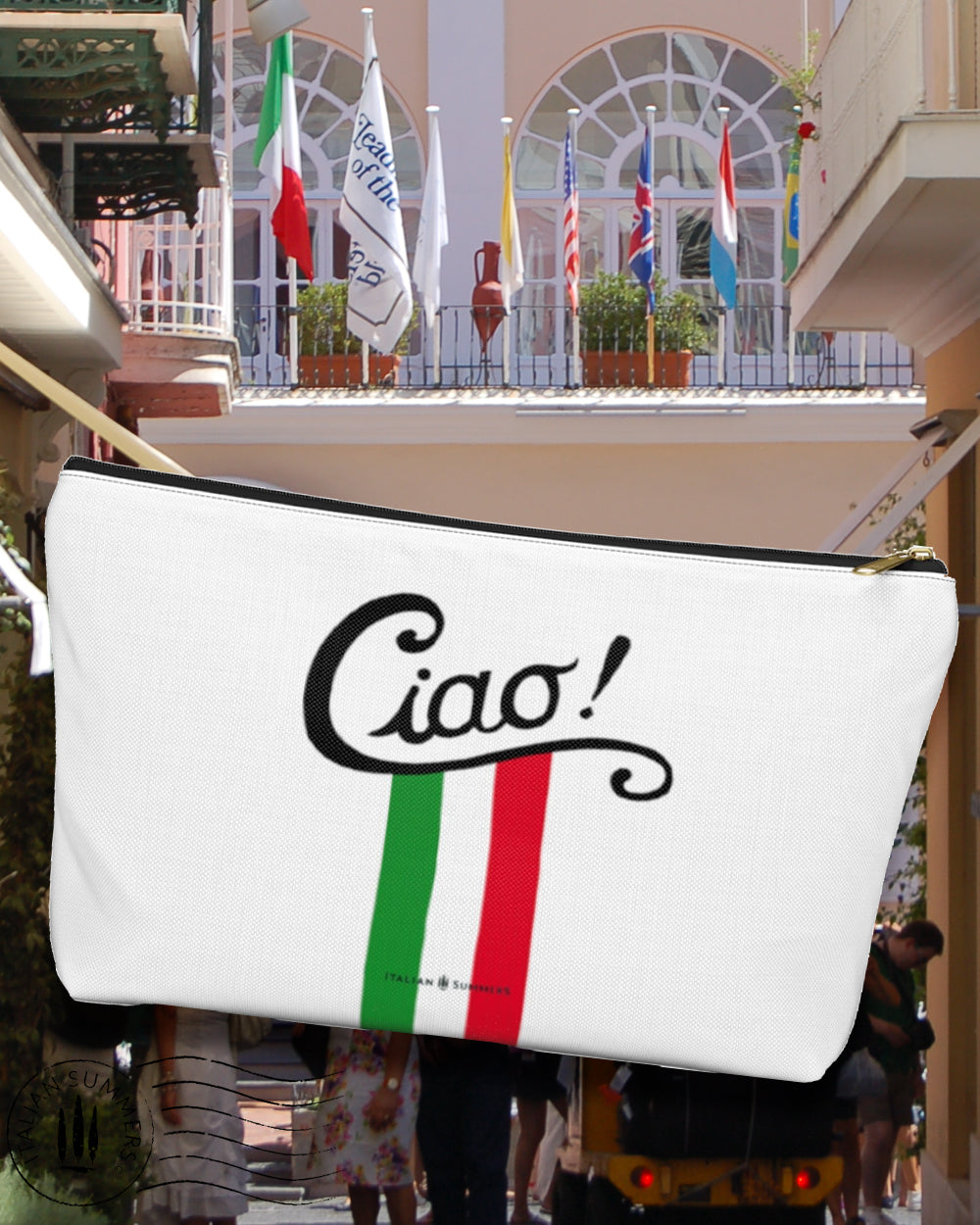 The Clutch CIAO ITALIA is a fun and stylish way to add a dash of Italian charm to any look! Crafted with vibrant stripes in the colors of the Italian flag, it's sure to spread some amore everywhere you go! And with the word "Ciao!" across the front