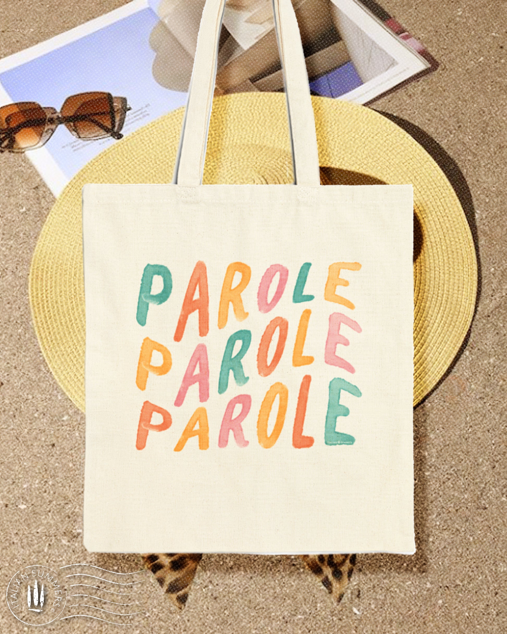 A  happy-looking Natural Cotton Tote bag with the Italian quote 'Parole Parole Parole, printed with  hand-brushed multi-colored letters. Perfect for the beach, shopping or just a stroll in the Piazza.