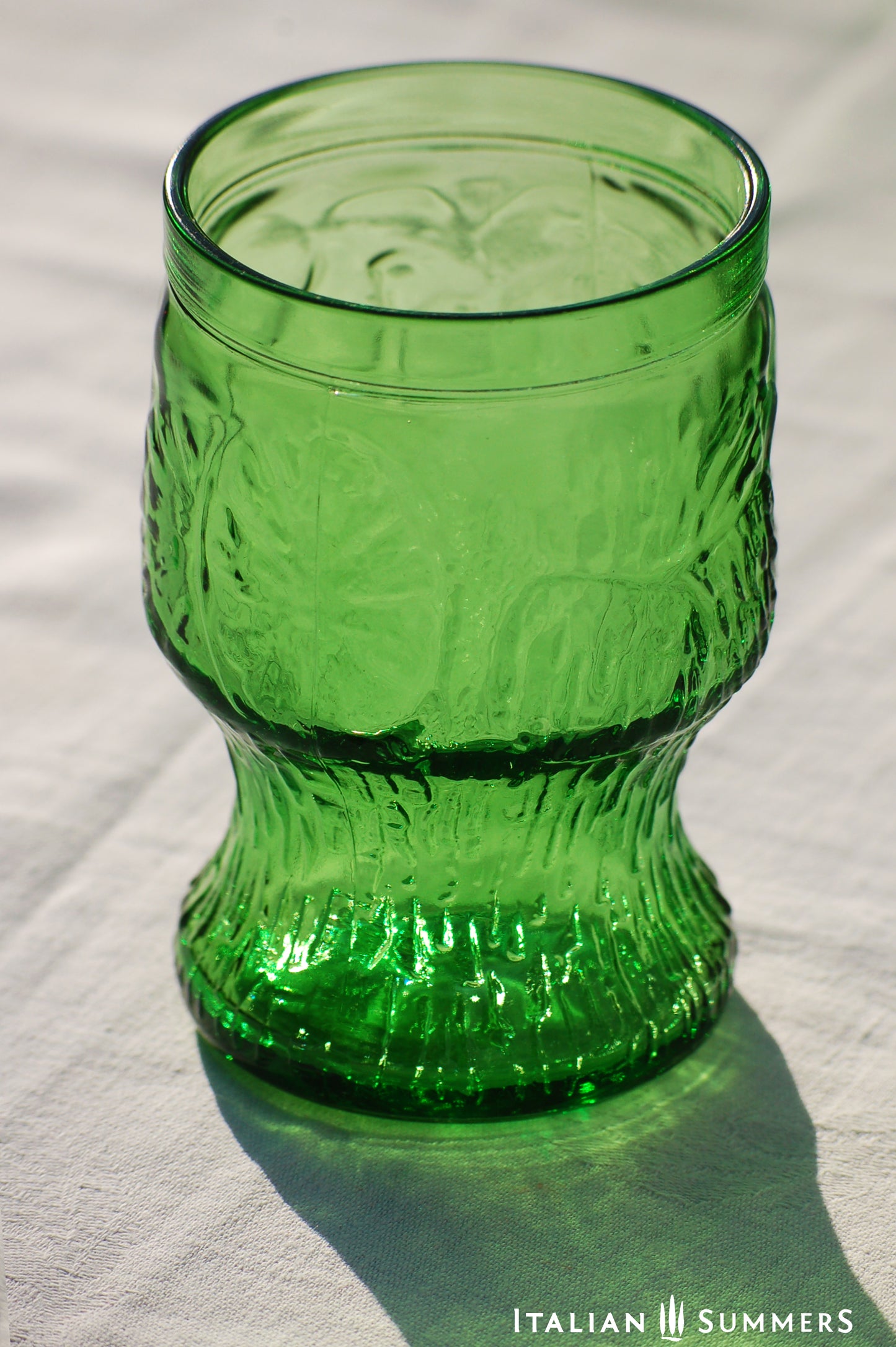 Italy vintage green glass set by Bormioli with embossed Lemon slices, 6 tumblers and a carafe by Italian Summers