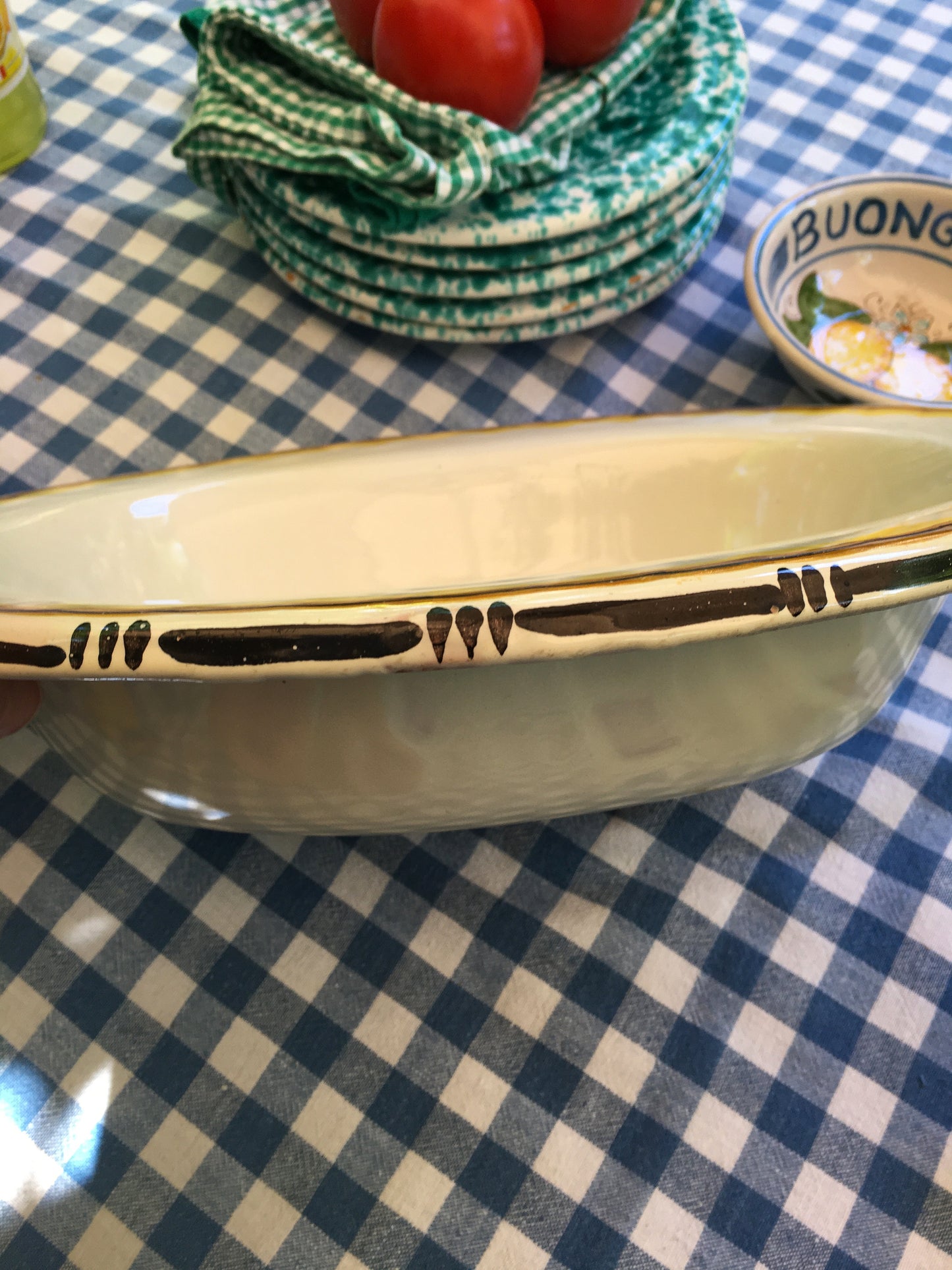 Vintage ceramic serving plate with hand-painted bird in the center from Tuscany
