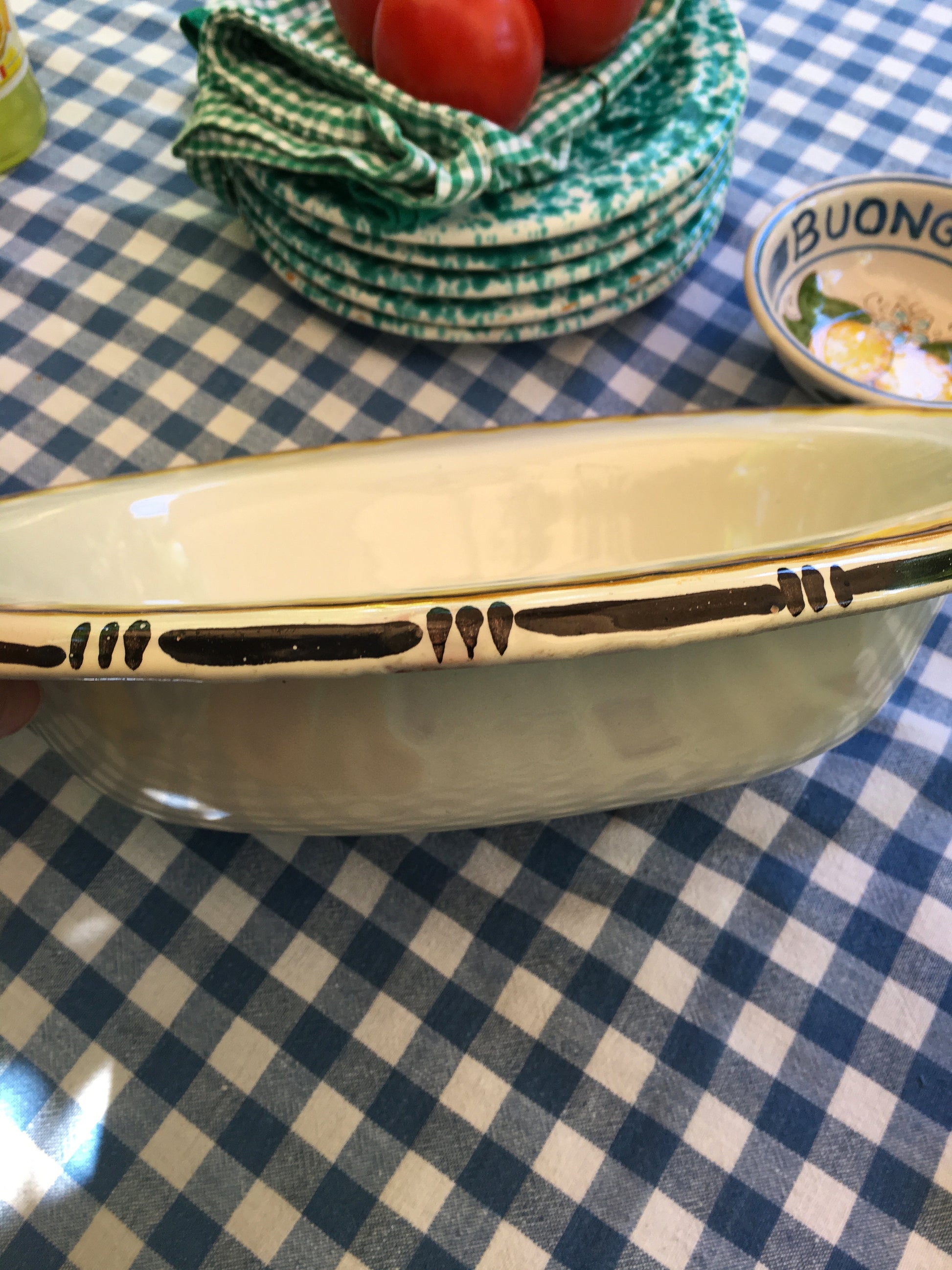 Vintage ceramic serving plate with hand-painted bird in the center from Tuscany