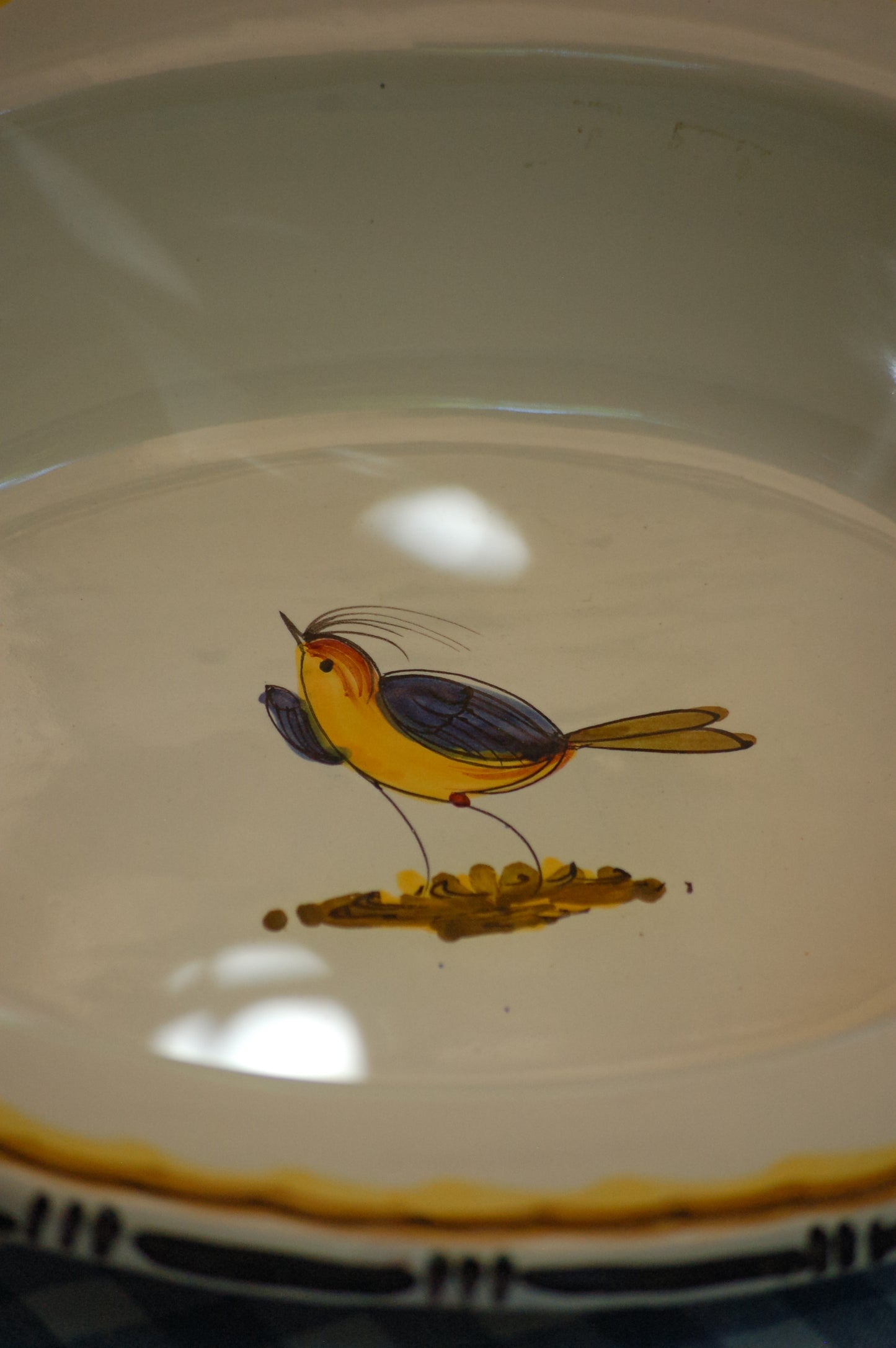 Vintage ceramic serving plate from Tuscany with hand-painted little bird
