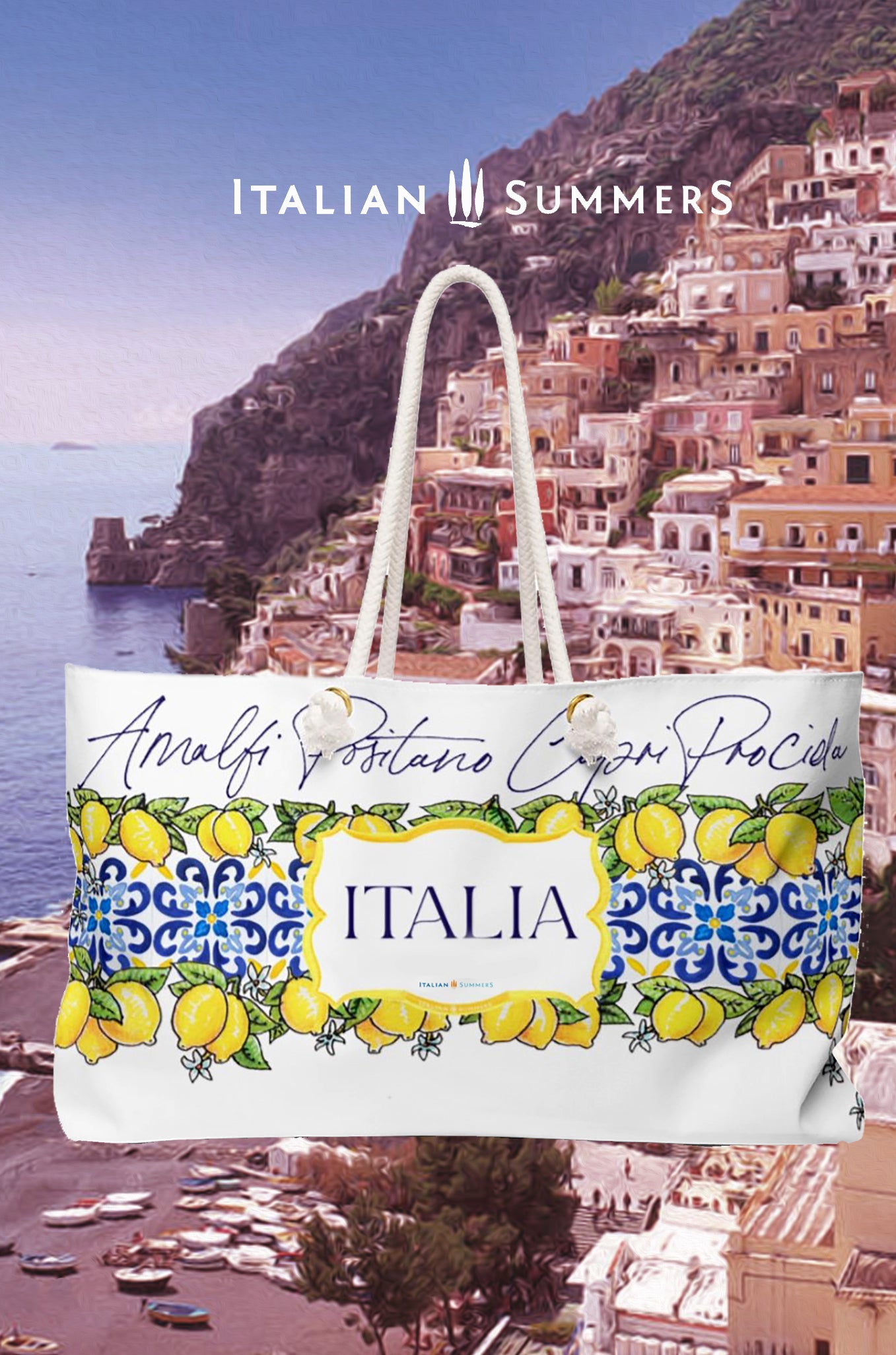 Italy-inspired XL Beach Bag  with printed blue Italian tiles in a  large band across the entire bag , framed with garlands of sunny, leafy Sorrento Lemons  with flowers. A large cartouche -like crest in the middle has the word  ITALIA - Seaside location names are writthen in flowing hand-script in blue across the top of the design. Sorrento, Positano, Ravello, Praiano, Capri, Amalfi, Procida,  made by Italian Summers