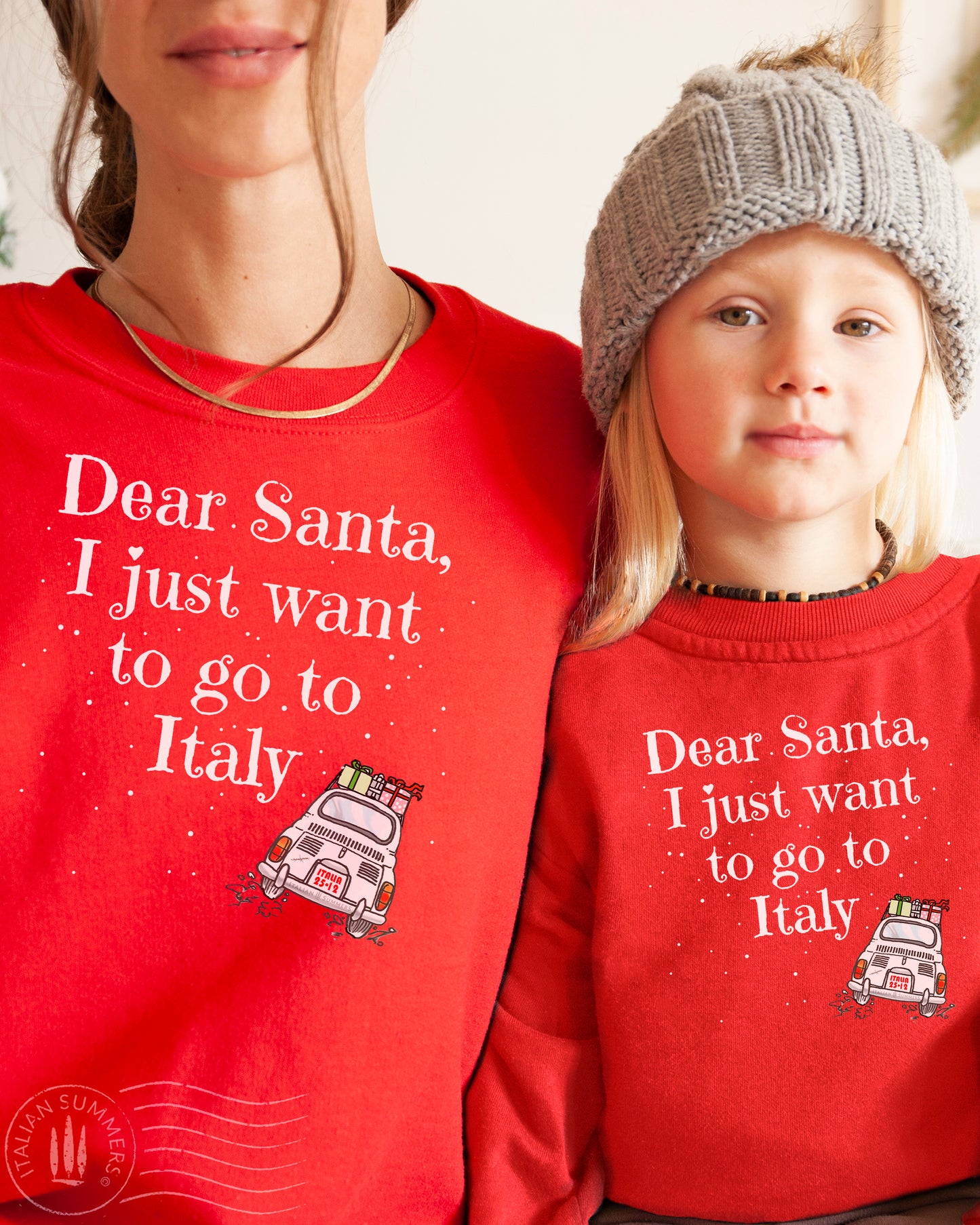 A soft, comfy and cozy Italy-Christmas inspired sweatshirt. It features the fun phrase: "Dear Santa, I just want to go to Italy", and a vintage Fiat 500 speeding away loaded with wrapped Christmas gifts: Buon Natale!