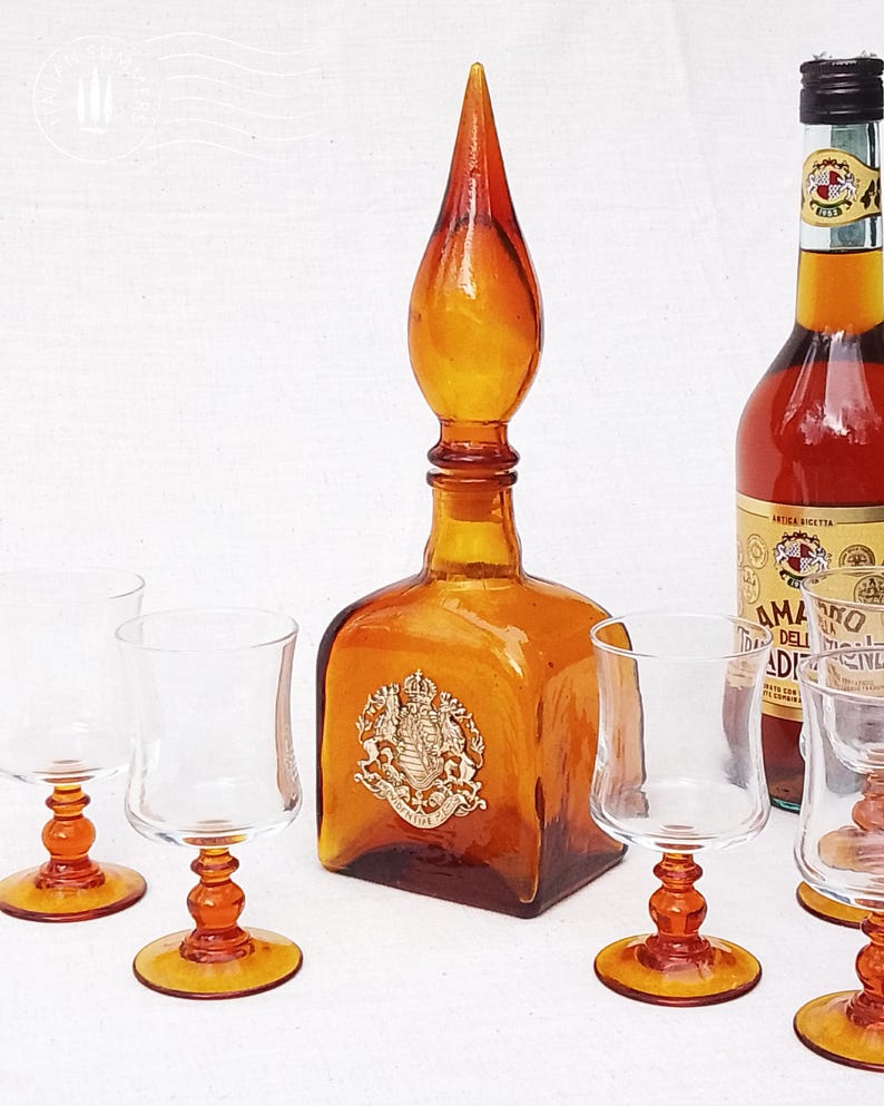 Vintage 1960-70s Empoli amber glass decanter and four baroque glasses set, genie bottle.