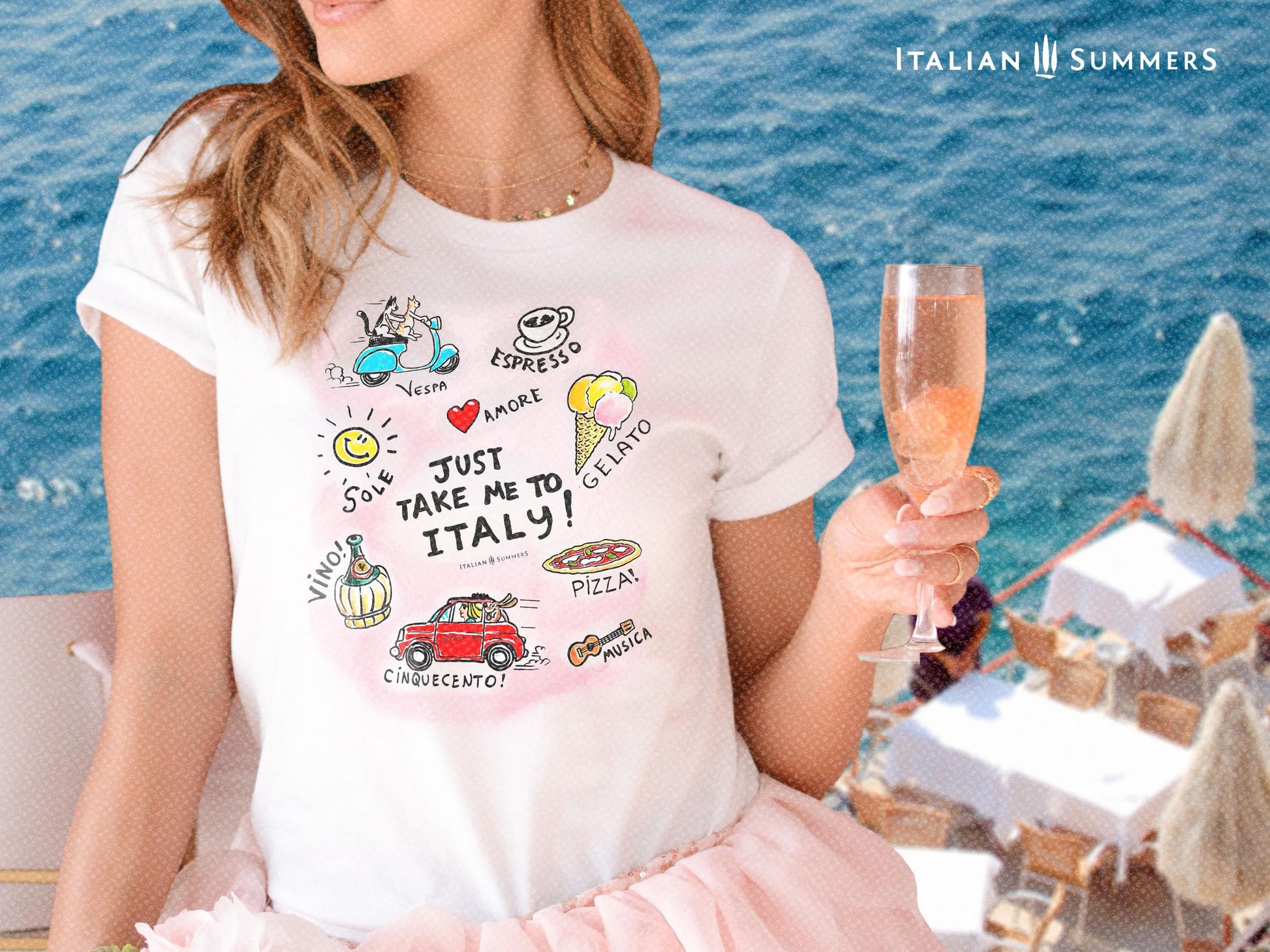 T-Shirt Just Take me to Italy- by Italian Summers. A T-shirt featuring the handwritten phrase JUST TAKE me to ITALY surrounded by sketches of an espresso cup, a vintage FIAT car, A vespa scooter driven by two cats, a gelato cone, a pizza, a guitar.  perfect for Italy lovers and fans of la dolce vita. By Italian Summers.
