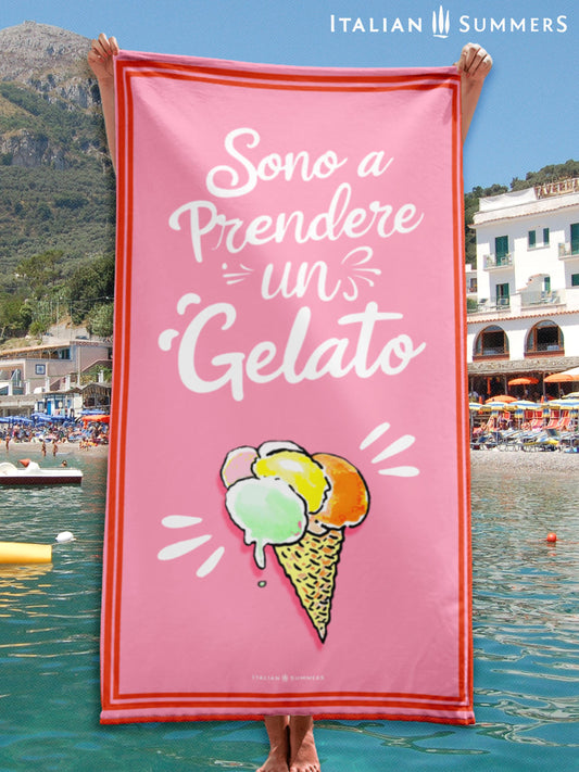 Italian gelato pink beach towel with the phrase Sono a Prendere un Gelato means I'm gone to get an ice cream, and a sketch of an Italian ice cream cone with pastel colored ice cream, perfect for Italian summer vibes and beach days. By Italian Summers