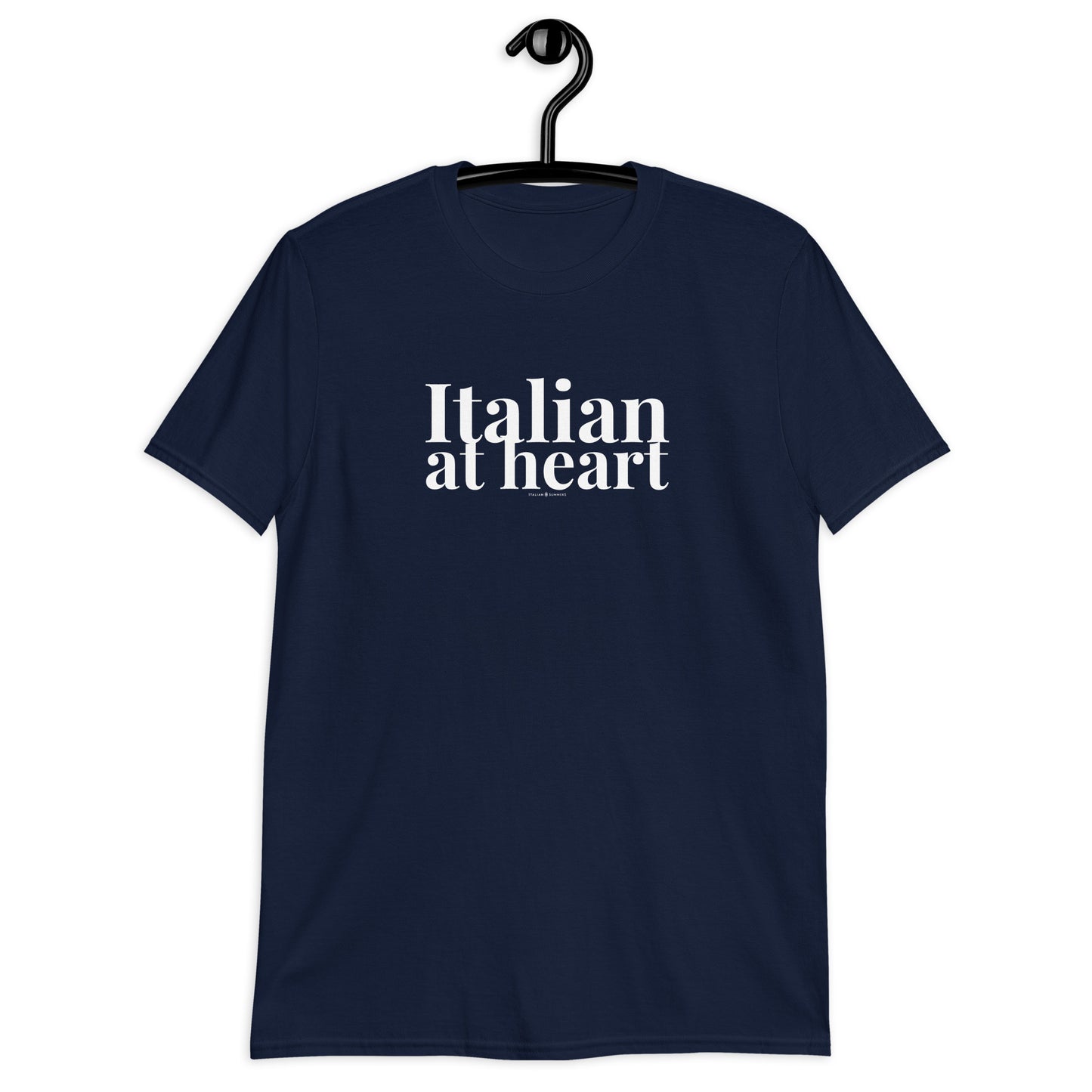 A girl wears a navy blue all cotton t shirt with a retro-style white text print that states: ITALIAN AT HEART