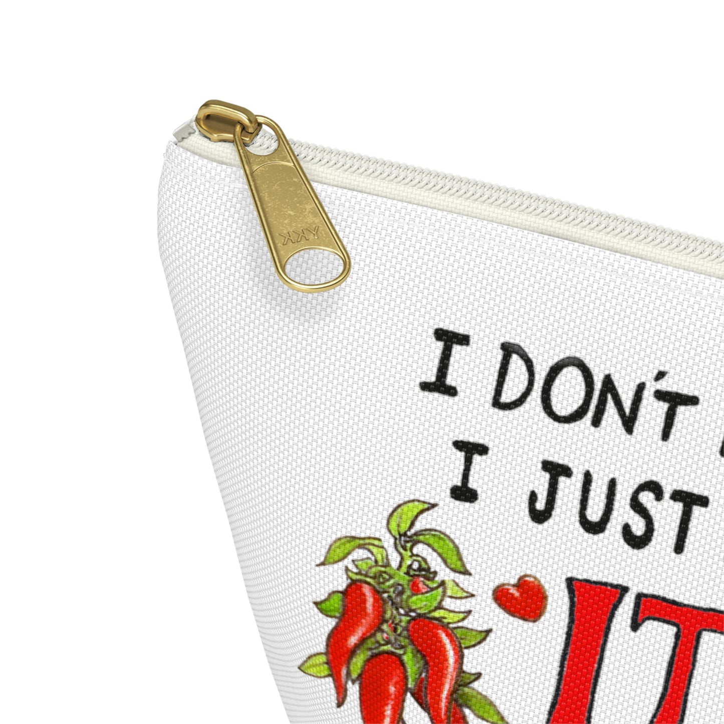 Italy inspired white canvas clutch with the quote I don't need therapy, I just need to go to Italy. The quote is in handwritten with the word Italy in red. On both sides of Italy there are bundles of peppers. The clutch has a black zipper that fits with the black text. Designed by Italian Summers