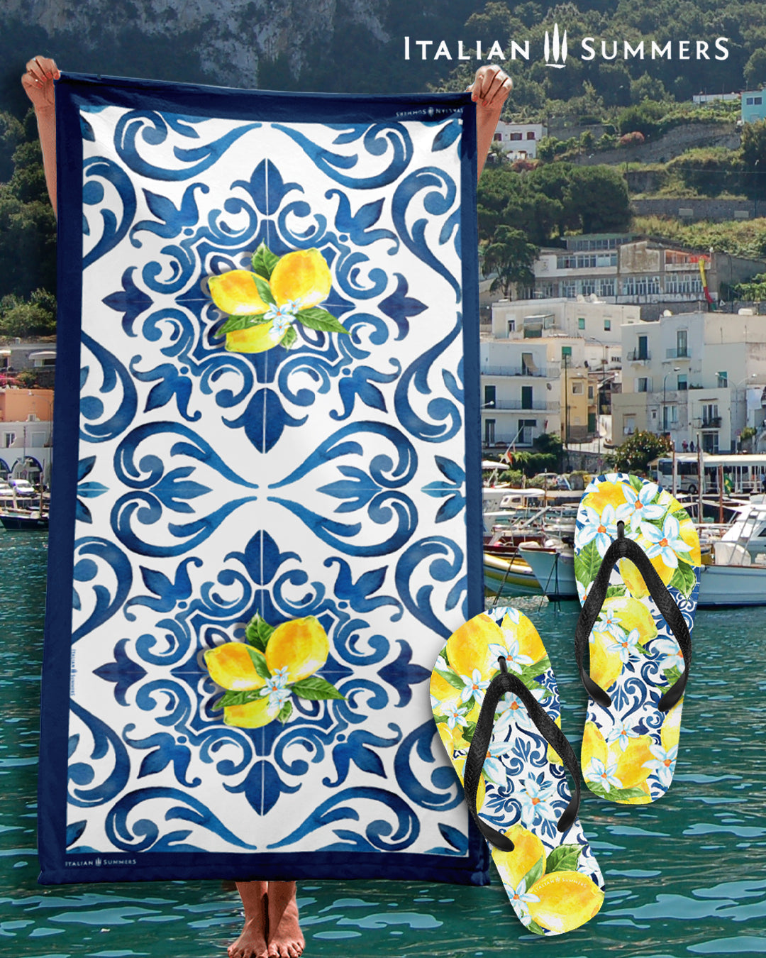 Italy flip flops with big beautiful Sorrento lemons full of white lemon blossems. From under the lemons you can see the blue vintage tiles coming true. This photo shows also one of our blue tiles and lemons beach towels. Made by Italian Summers
