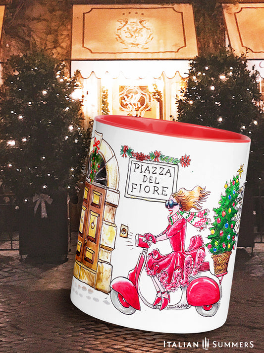 Italy Christmas mug featuring a red-dressed lady riding a vintage Vespa with her Christmas tree through a picturesque Italian landscape. Made by Italian Summers Copyright material 