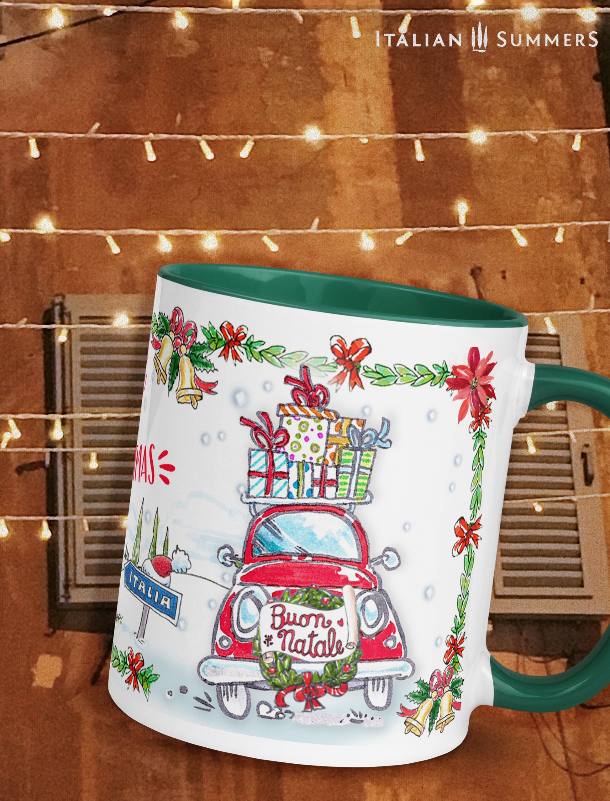 Italy Christmas mug with a red vintage Fiat 500 with presents on top and a writing Buon Natale, a little Tuscan village in the distance and the writing Drivng home for Christmas. Designed and sold by Italian Summers