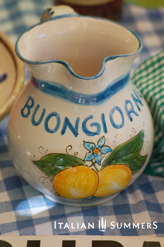 Bright and happy Italian ceramic brocca with handpainted Amalfi Coast lemons and the text Buongiorno in the color azur blue. By Italian Summers