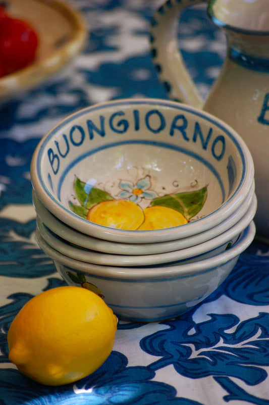 Italian ceramic lemon bowls with the text Buongiorno. The Amalfi coast lemons are hand painted on the inside of the bowl and the word Buongiorno is on the inside on the top of the rim. By Italian Summers