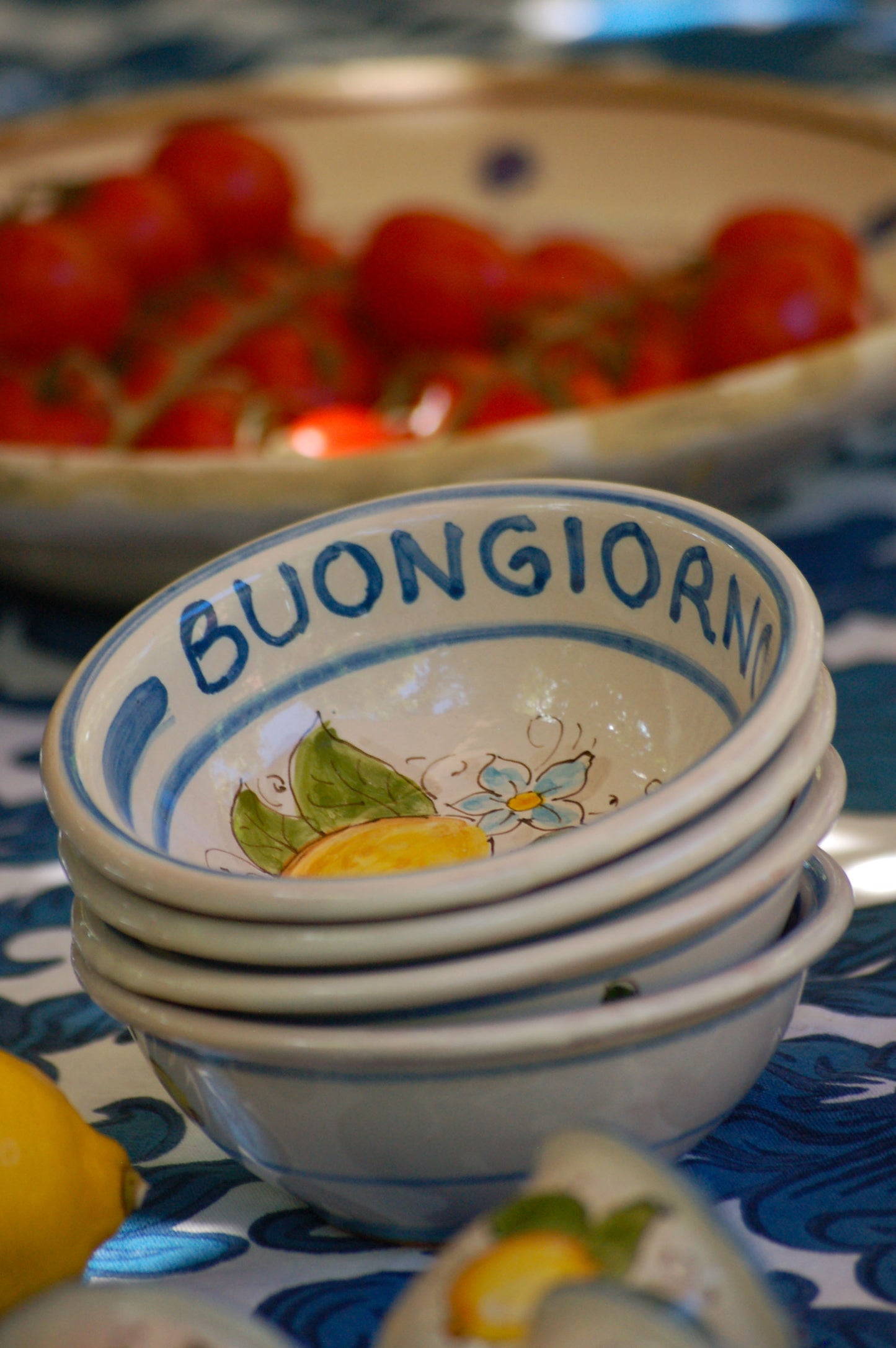 Italian ceramic lemon bowls with the text Buongiorno. The Amalfi coast lemons are hand painted on the inside of the bowl and the word Buongiorno is on the inside on the top of the rim. By Italian Summers